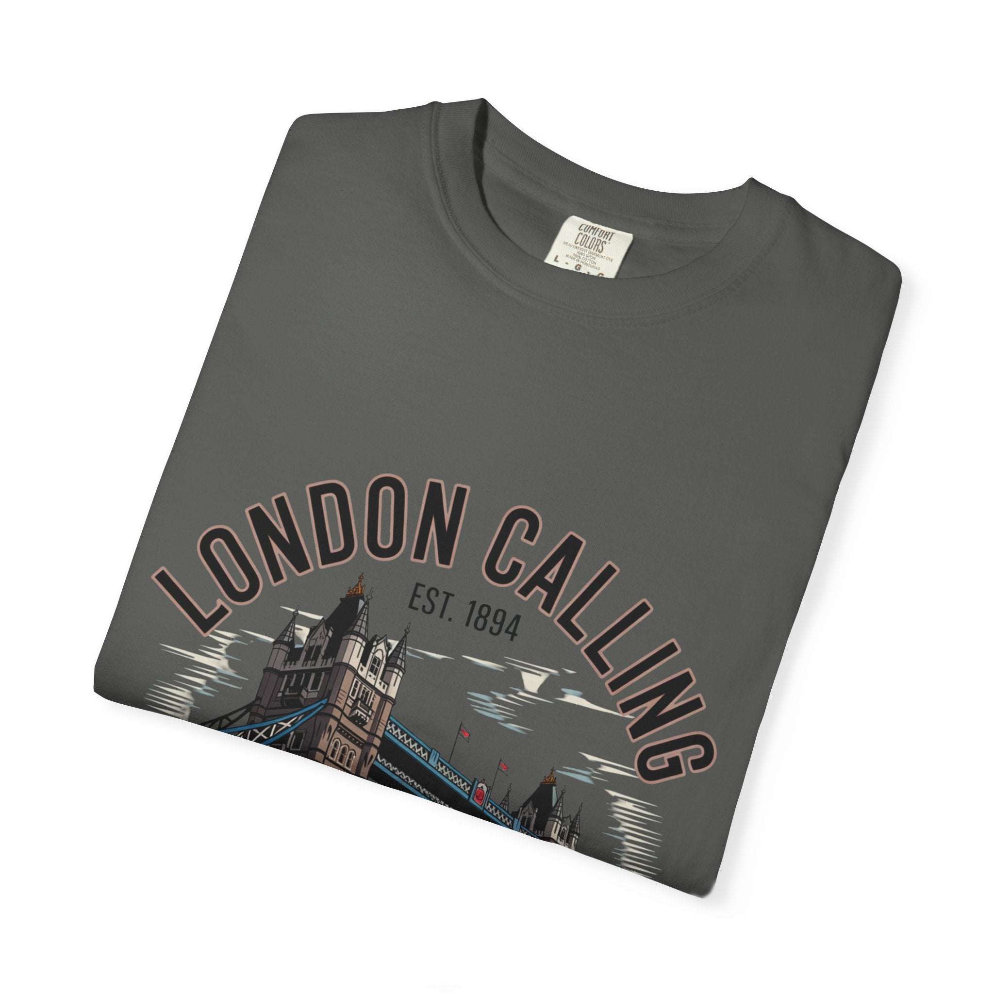 Folded London Calling Travel T-shirt in charcoal with Tower Bridge graphic and text design