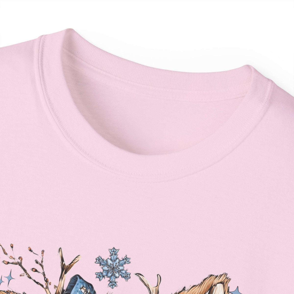 White t-shirt with retro patchwork reindeer design wearing blue scarf and surrounded by snowflakes