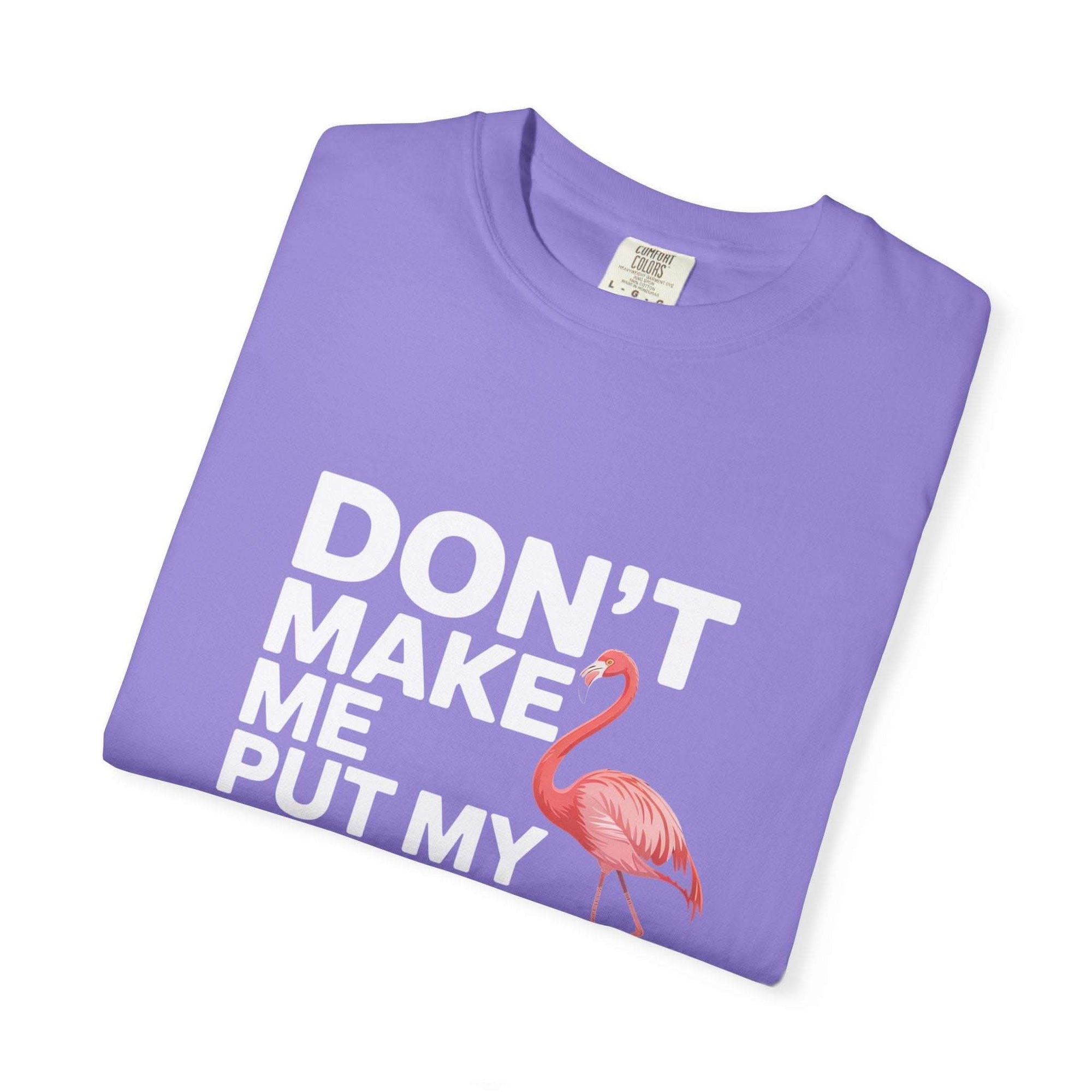 Dont Make Me Put My Foot Down flamingo T-shirt with pink flamingo graphic and bold white text on vintage-dyed soft cotton fabric
