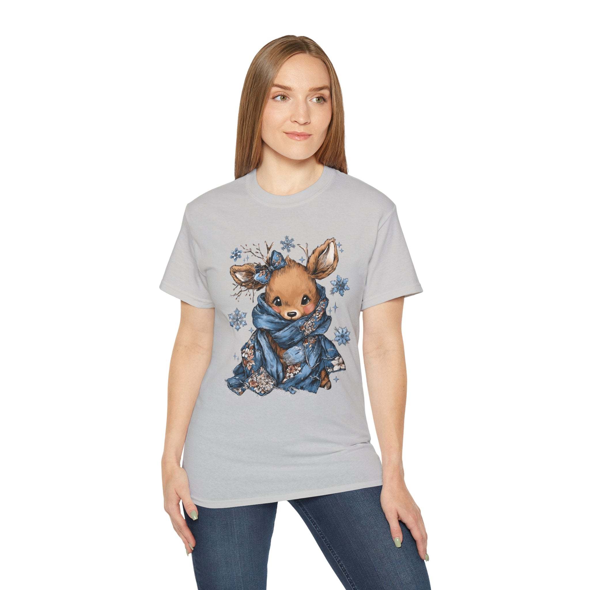Woman wearing retro patchwork reindeer t-shirt with blue scarf and snowflake design