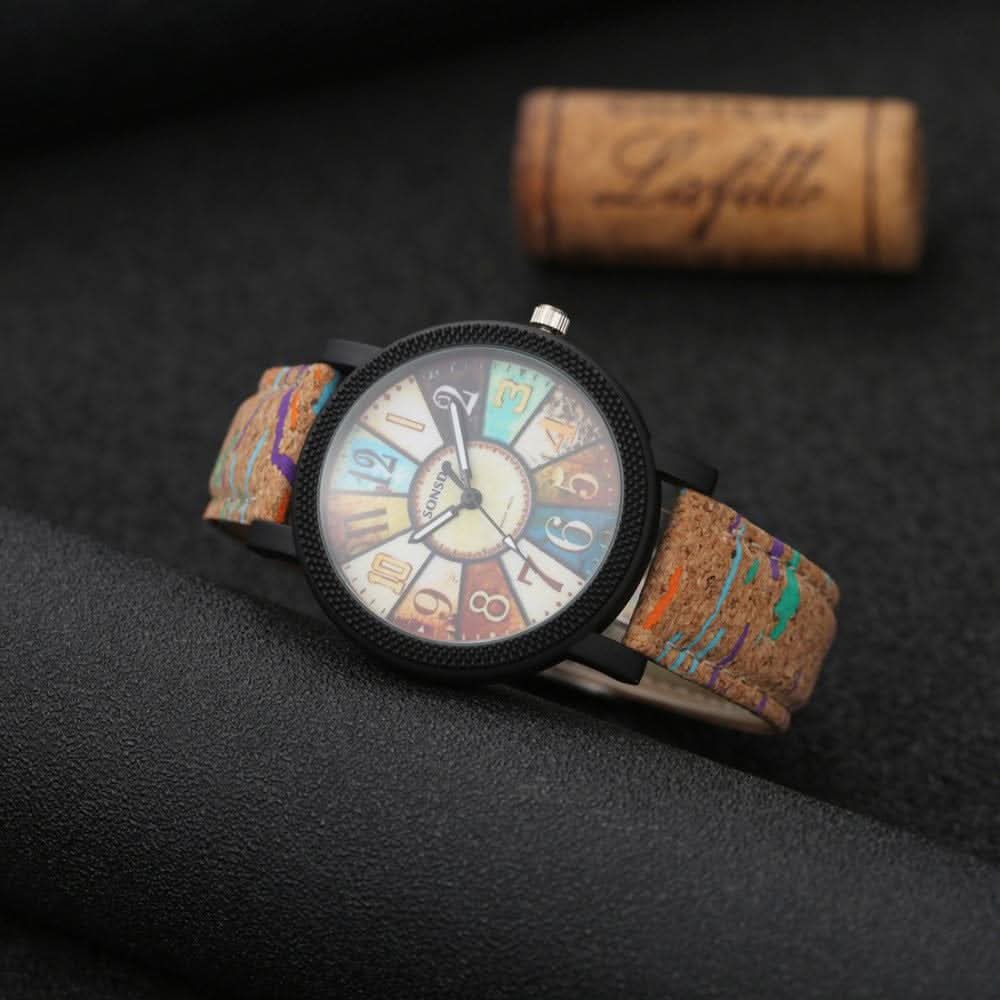 Vintage leather quartz watch with round dial and stainless steel pin buckle strap
