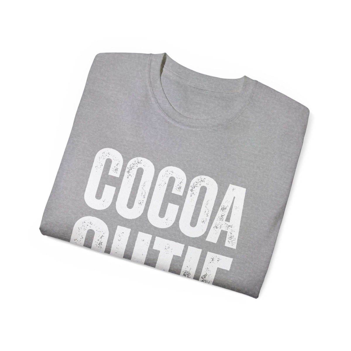 Folded gray distressed Cocoa Cutie Tee made from eco-friendly cotton with vintage style text