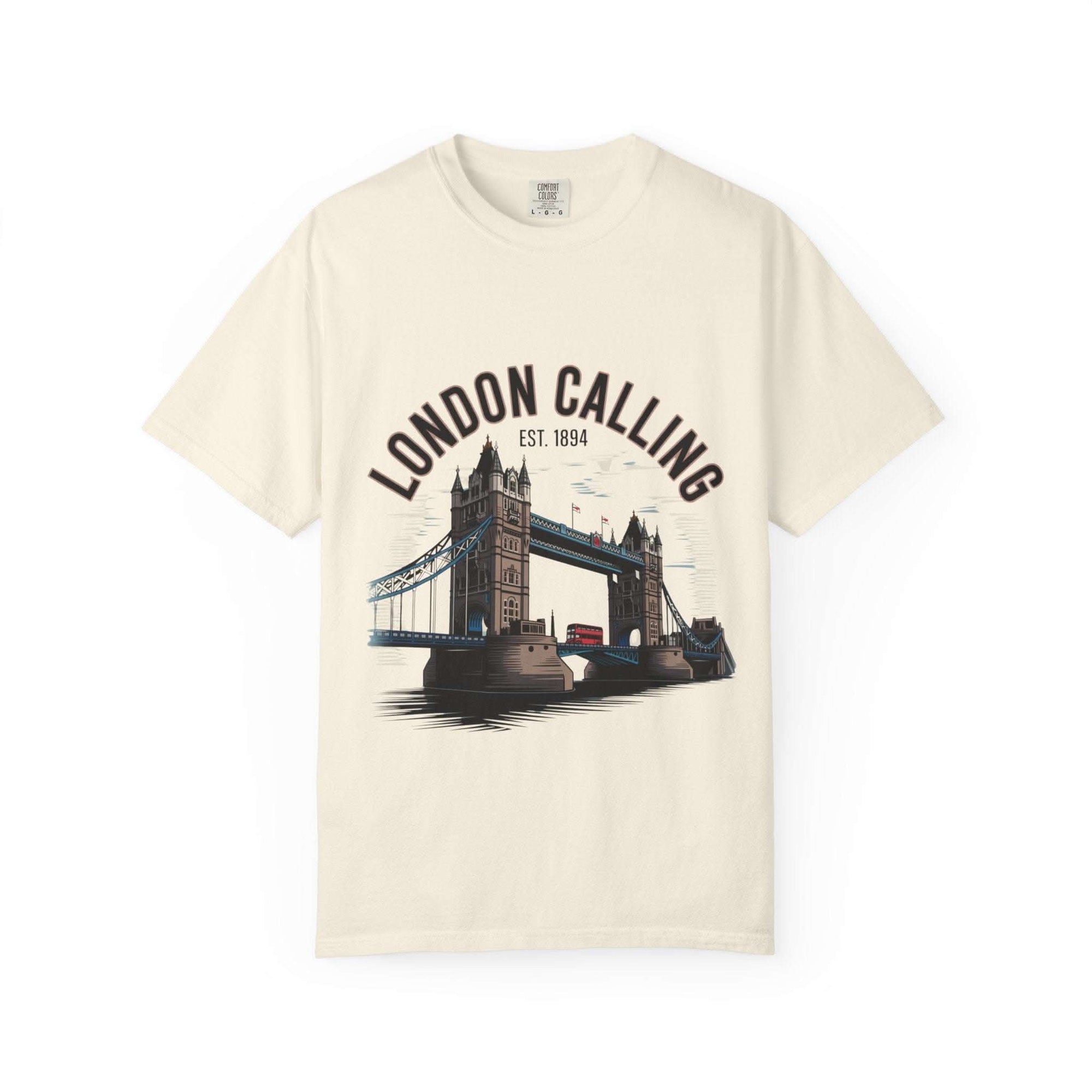 Unisex black garment-dyed t-shirt featuring 'London Calling' design, perfect for travel enthusiasts.