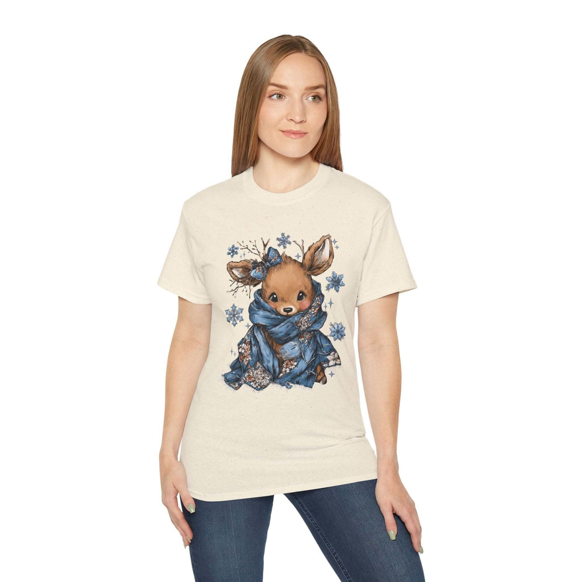 Woman wearing Retro Patchwork Reindeer t-shirt with vintage reindeer design and snowflakes in blue scarf