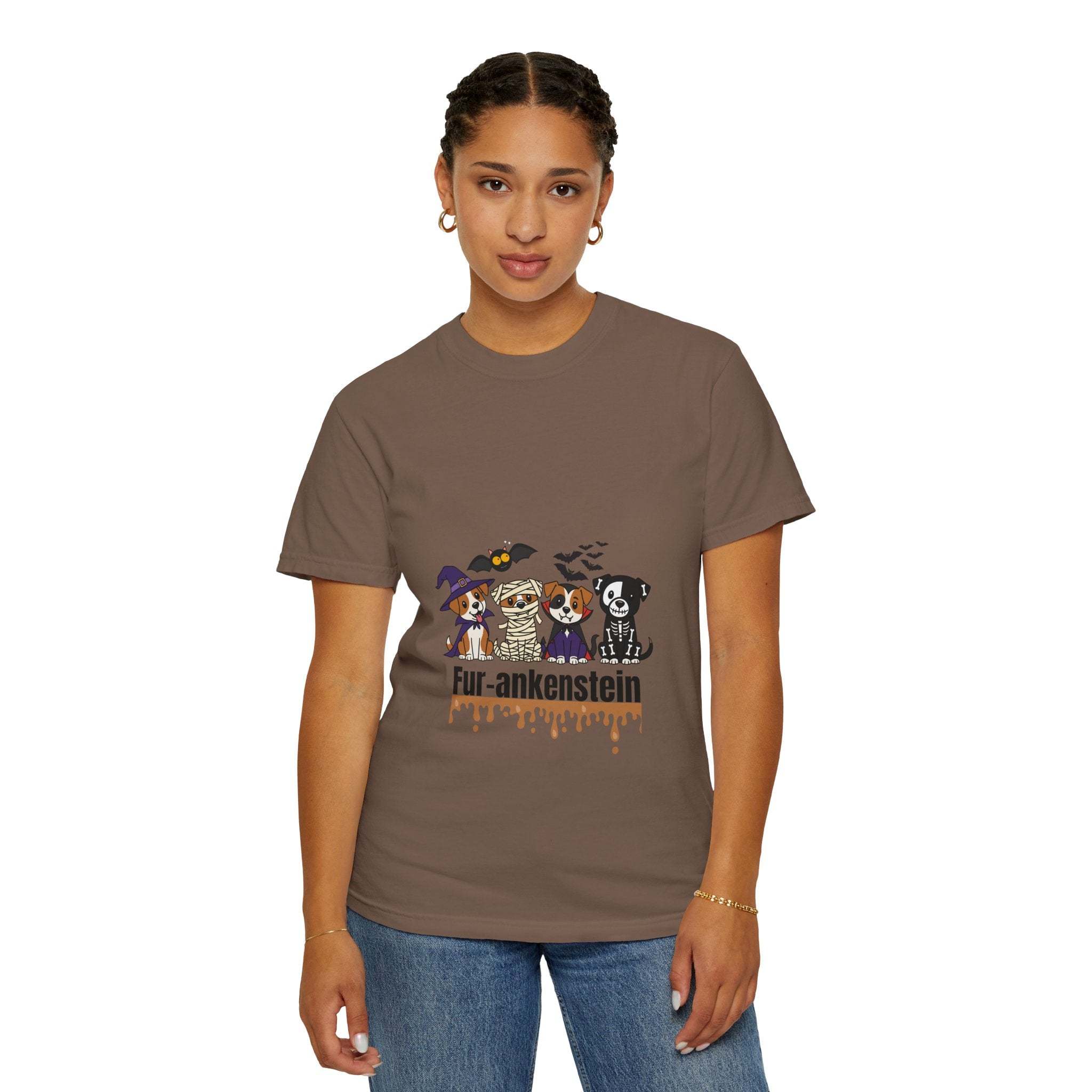 Woman wearing Puppies Halloween T-shirt with puppies in costumes on brown garment-dyed cotton tee