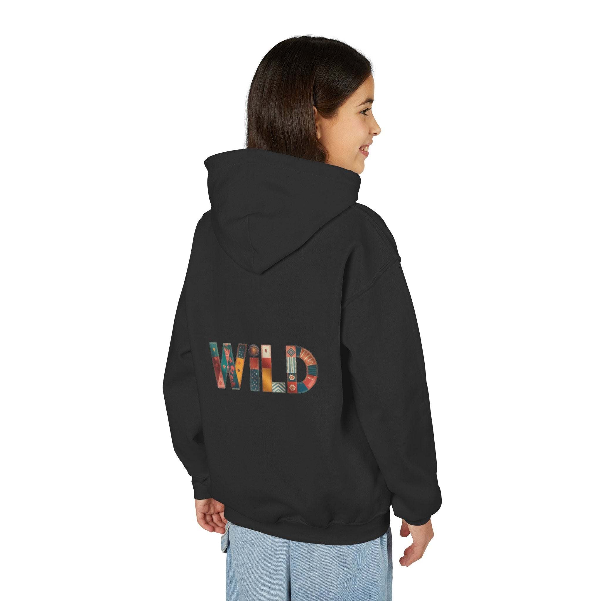 Child wearing black Patchwork Wild Word Hoodie with colorful "WILD" text on back and kangaroo pocket
