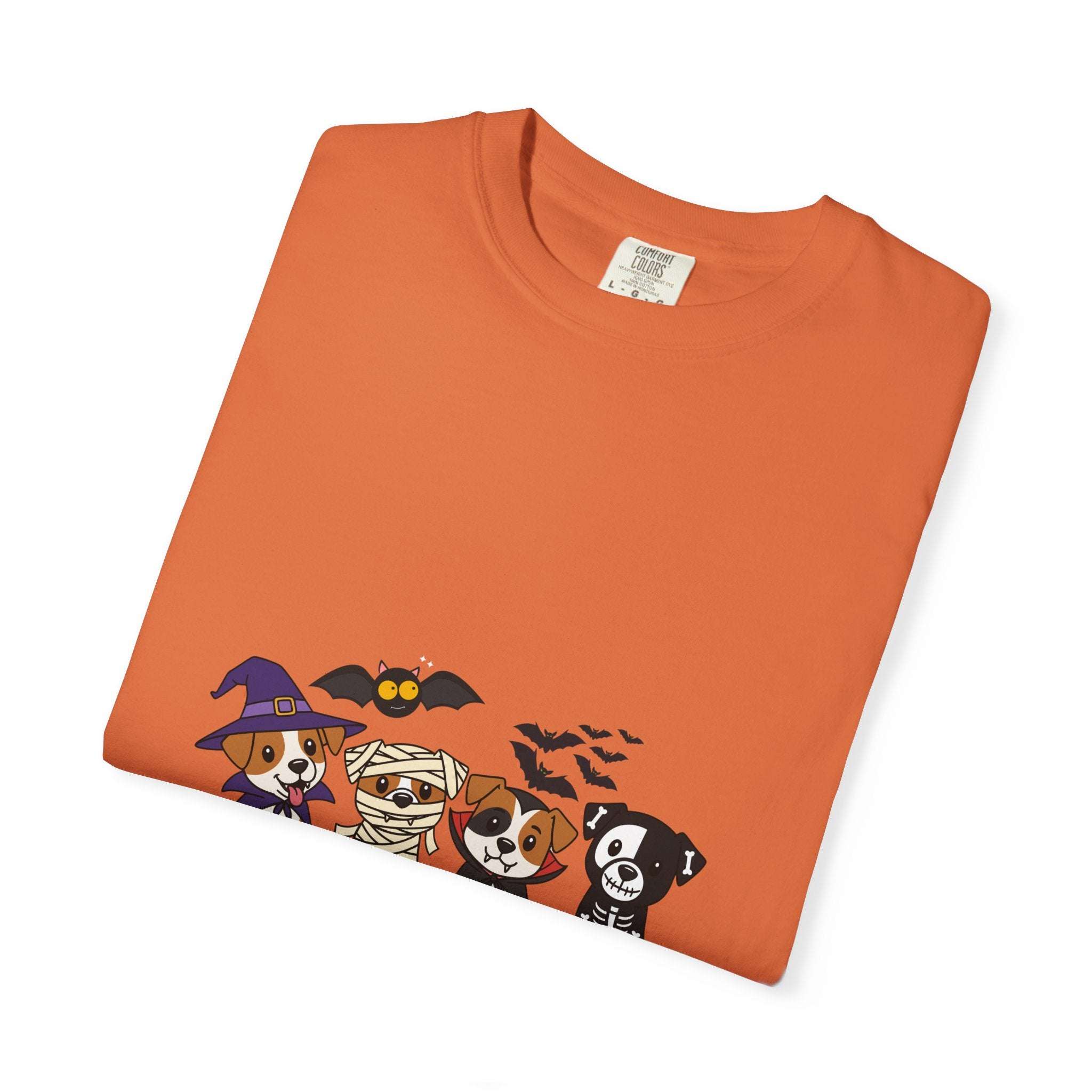 Orange Puppies Halloween T-shirt with puppies in costumes including witch, mummy, and skeleton, made of 100% cotton with relaxed fit