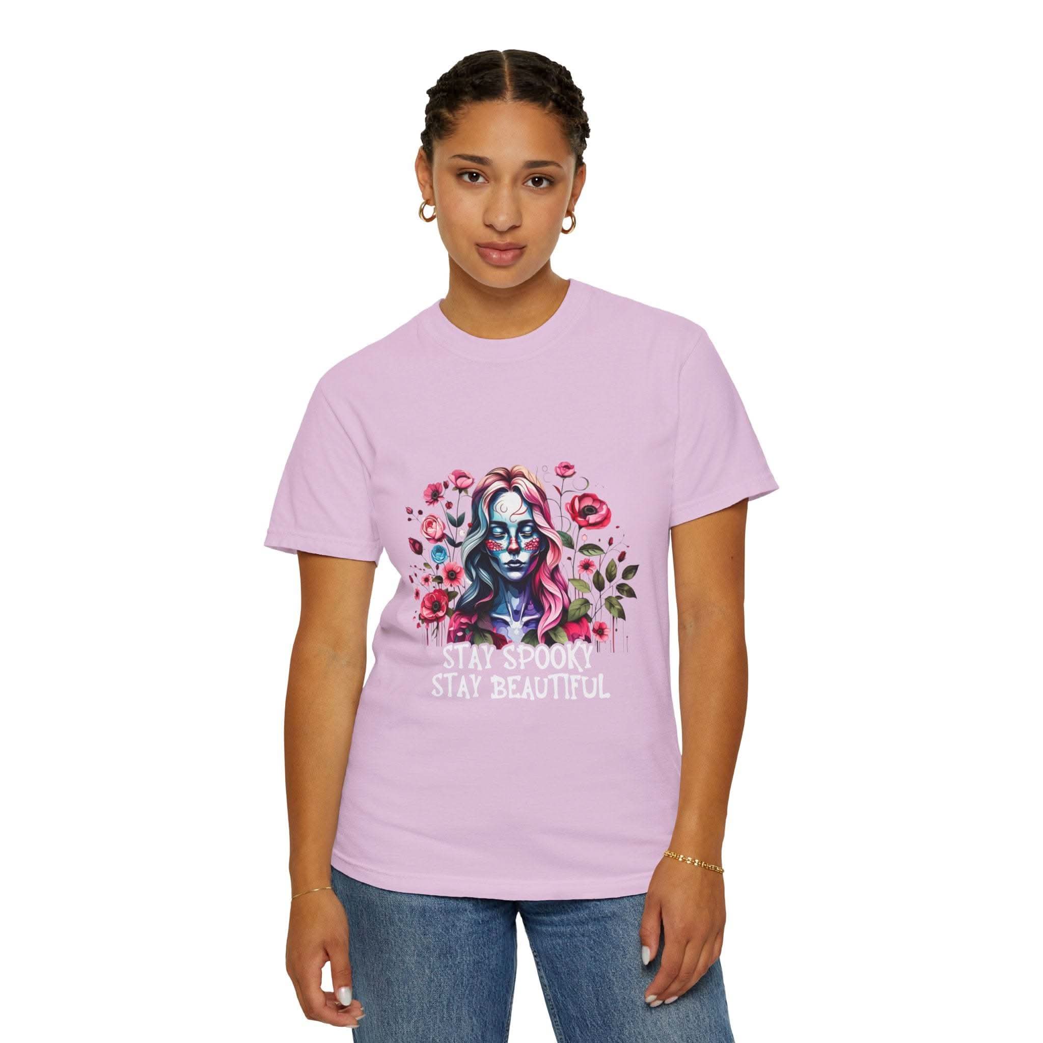 woman wearing pink floral skeleton t-shirt with Stay Spooky Stay Beautiful text