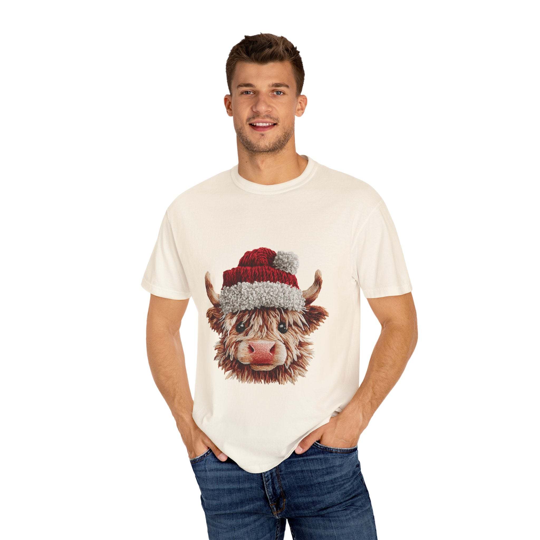 Man wearing Faux Crochet Yarn Highland Cow Santa print Christmas t-shirt