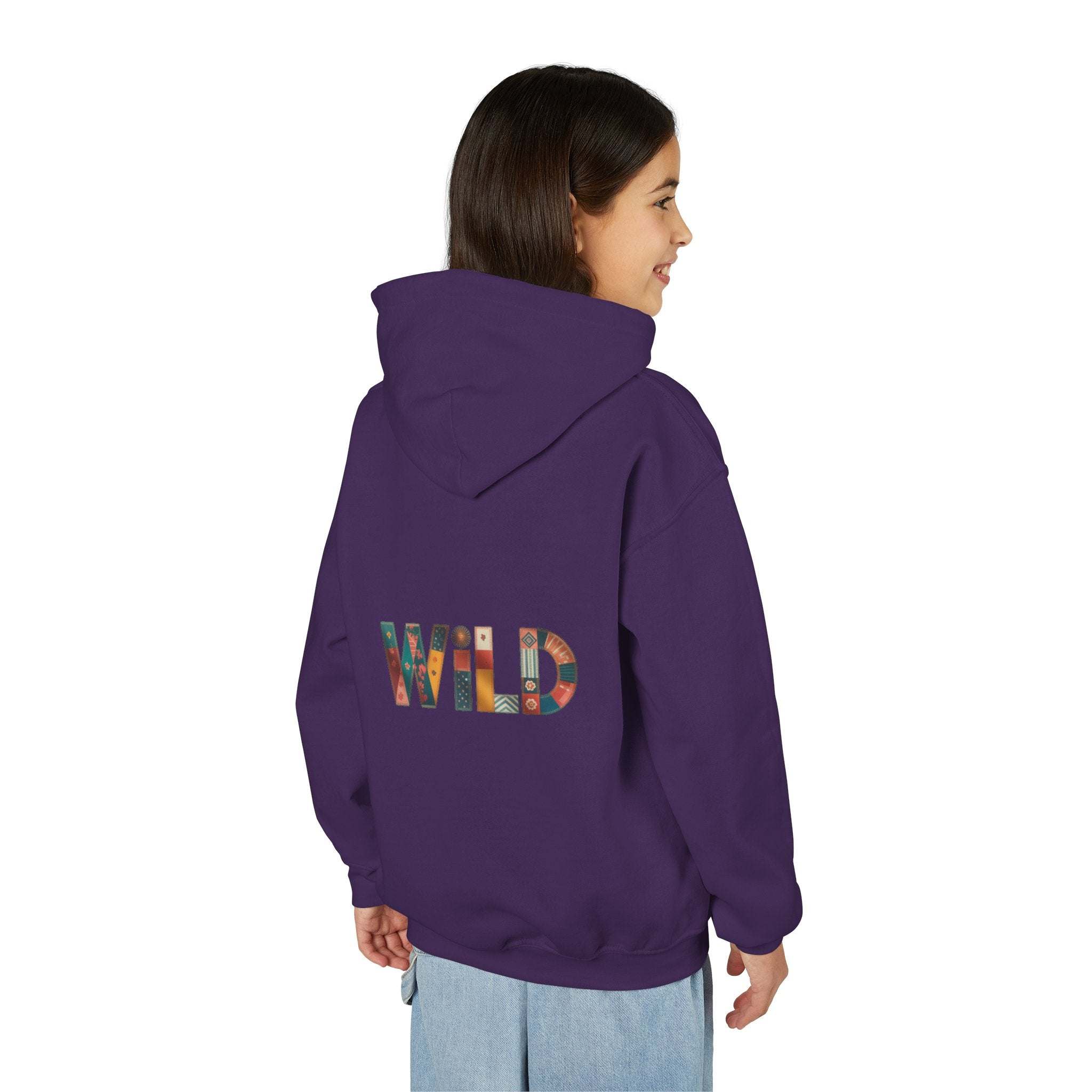 Child wearing purple Patchwork Wild Word Hoodie with colorful "WILD" embroidered on back and kangaroo pocket