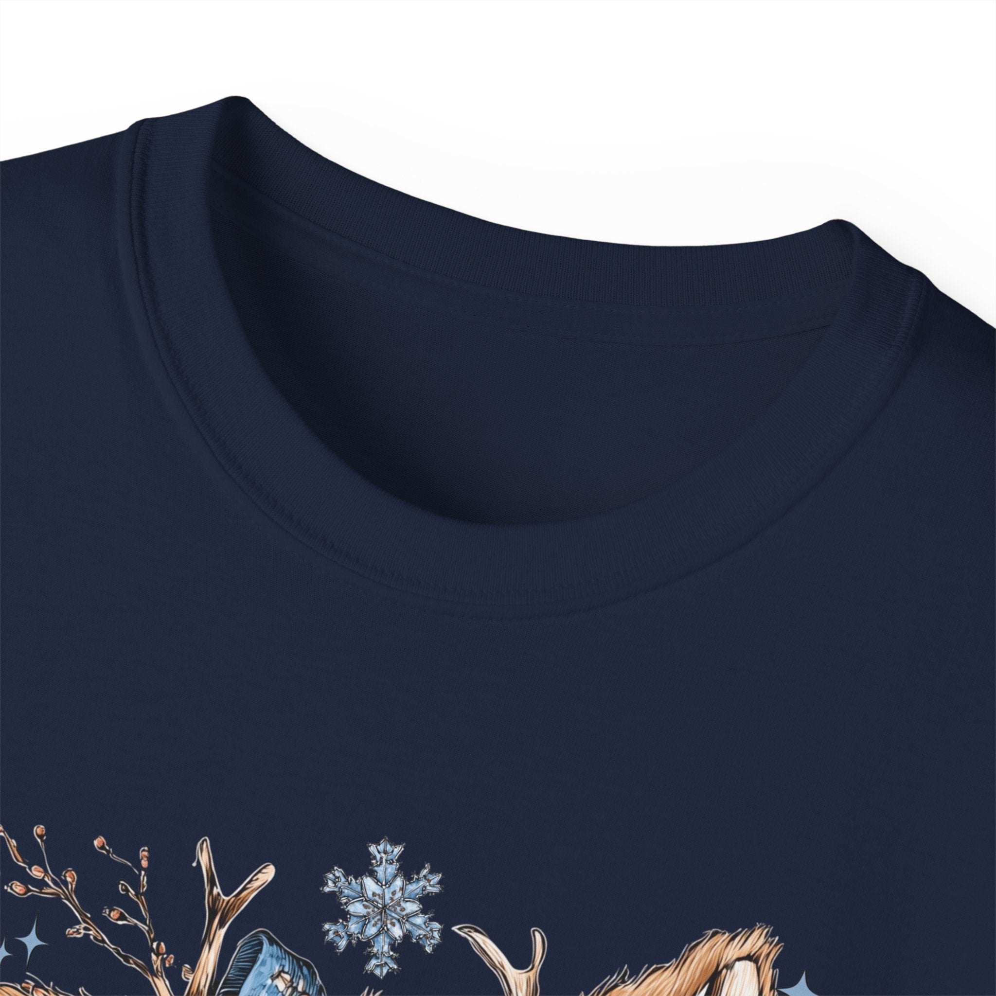 Close-up of navy blue Retro Patchwork Reindeer T-shirt with festive holiday design
