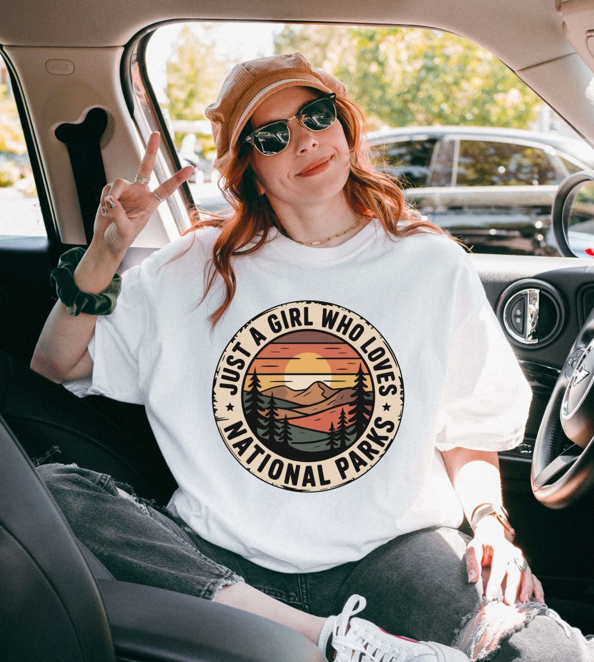 Woman wearing Just a Girl Who Loves National Parks T-Shirt made of soft, durable garment-dyed cotton