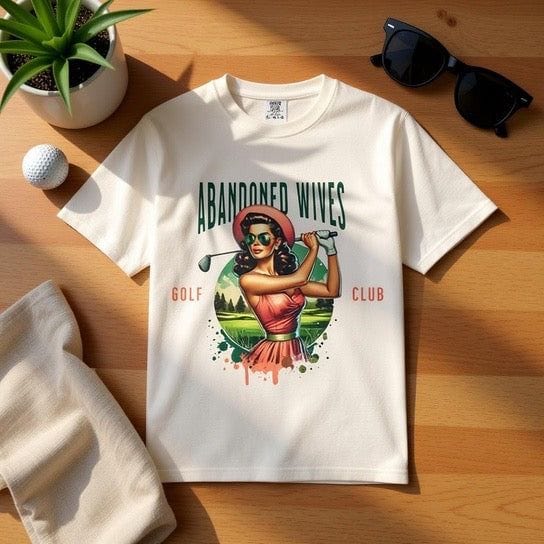 Vintage unisex T-shirt with humorous Abandoned Wives Golf Club graphic on soft cotton fabric