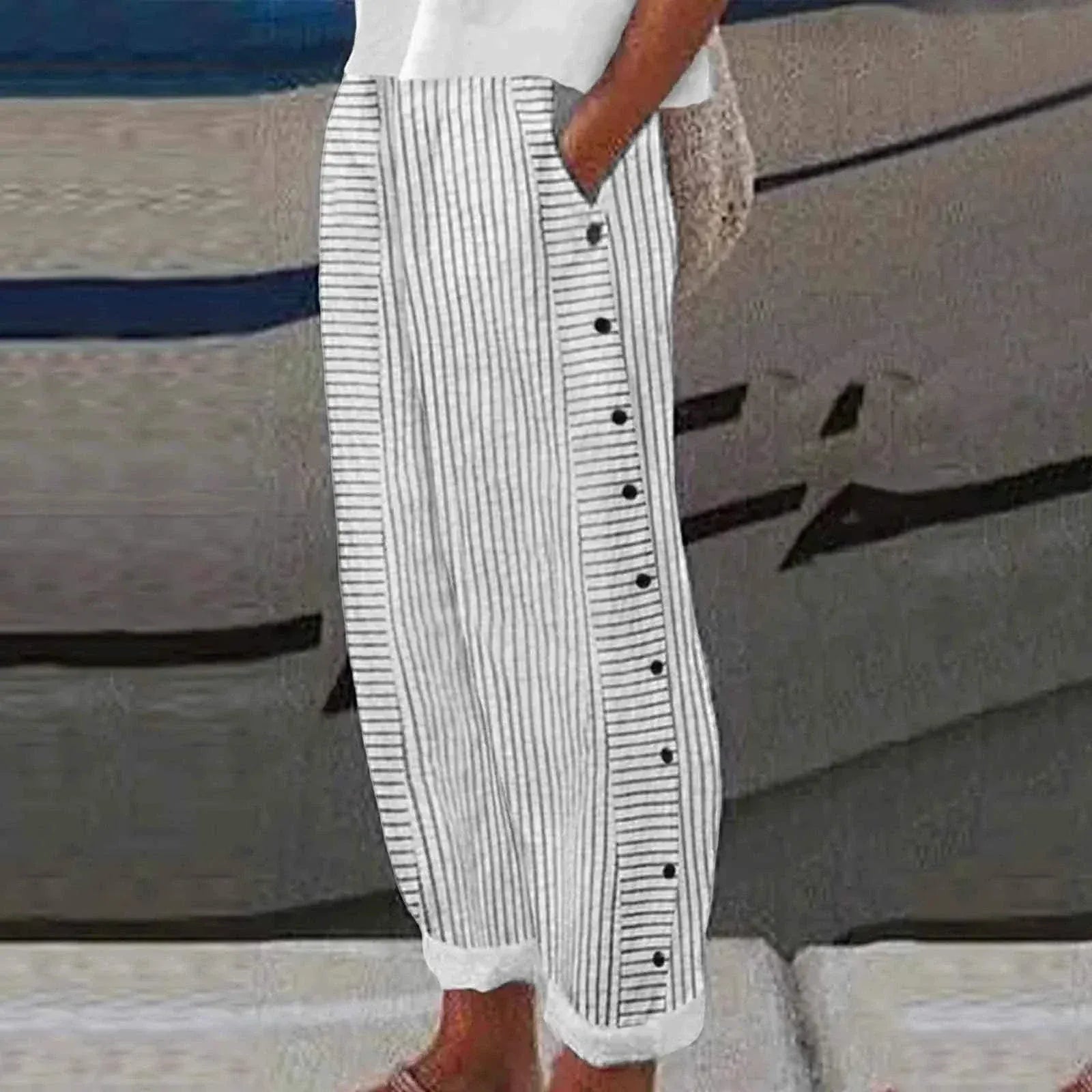 Women wearing casual loose long linen pants with striped print and button fly