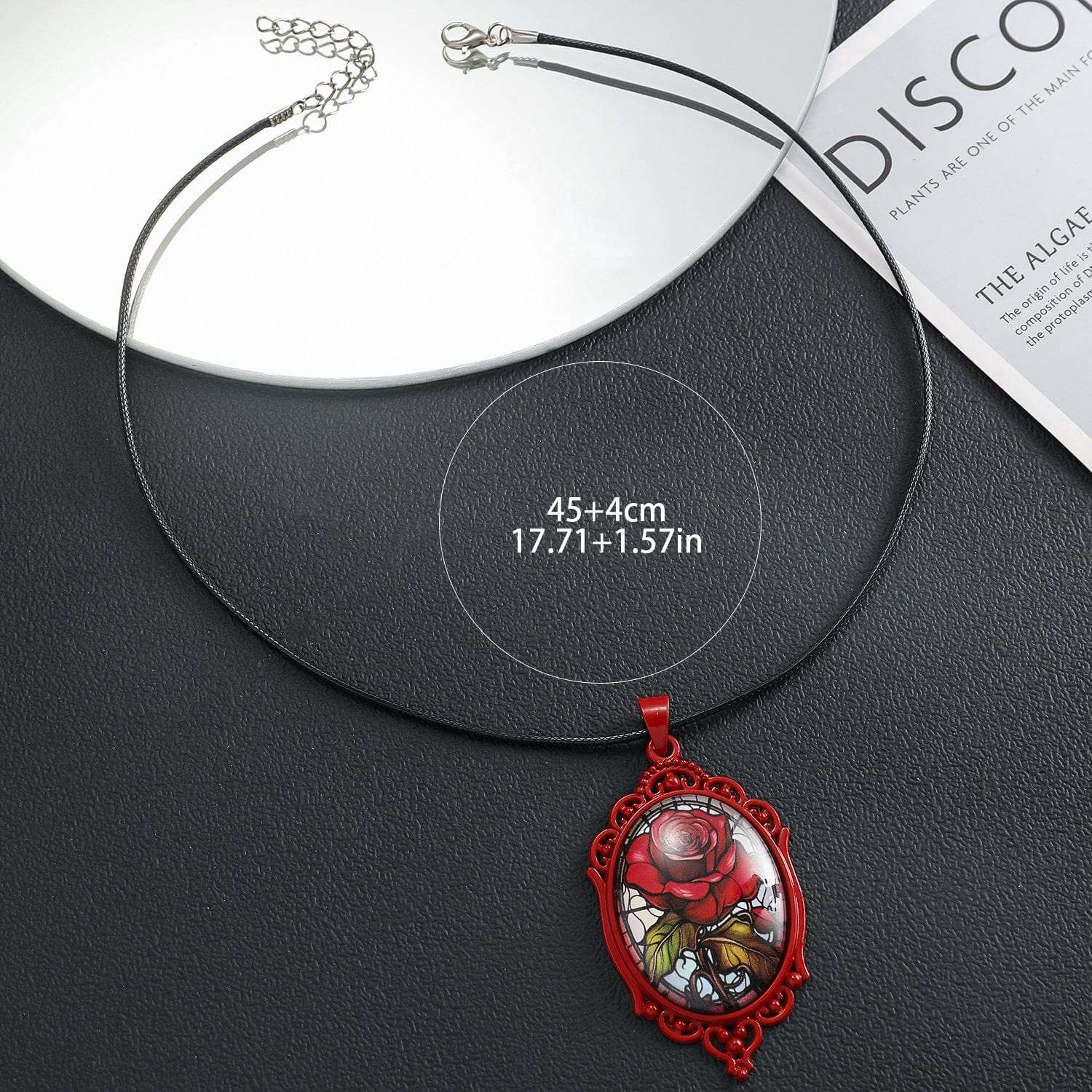 Elegant Gothic oval rose necklace in black, featuring a floral pendant by TeninoVentures.