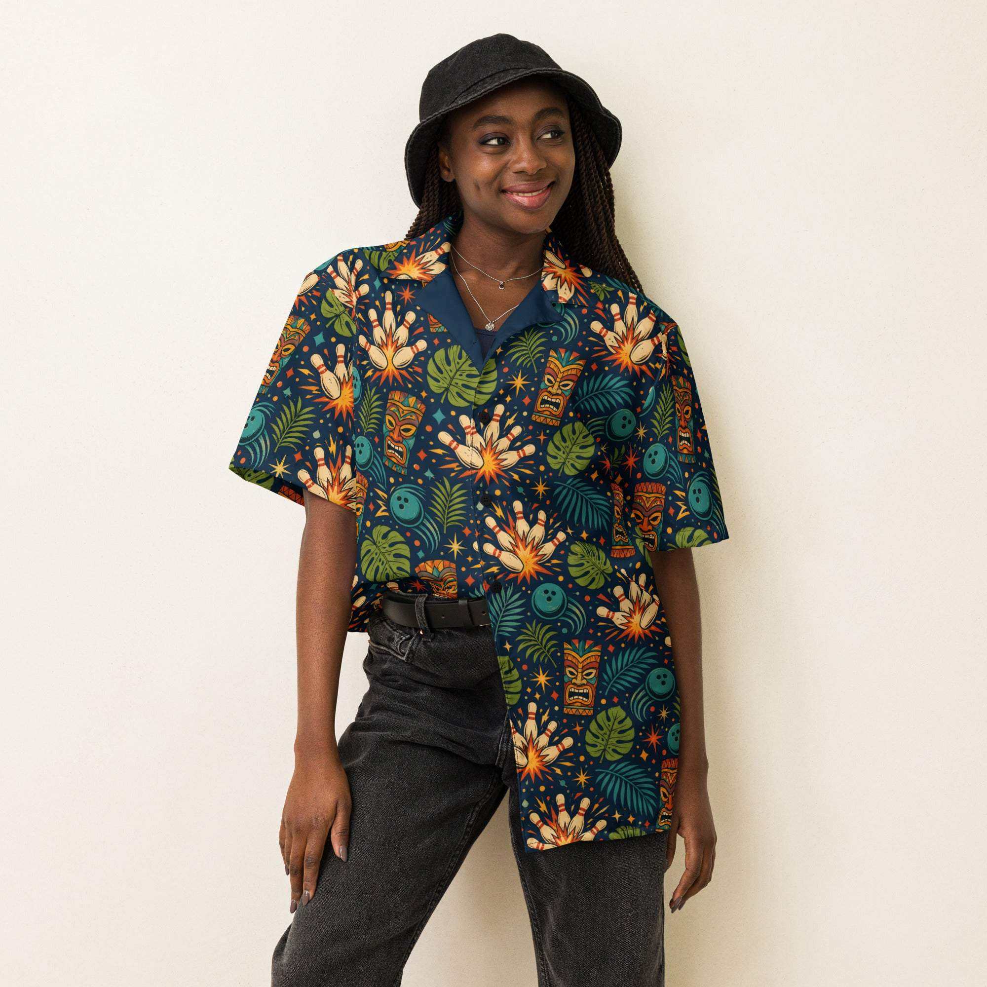 Navy Tropical Bowling Hawaiian Shirt with tiki masks, bowling pins, and jungle leaves print, camp collar button-down