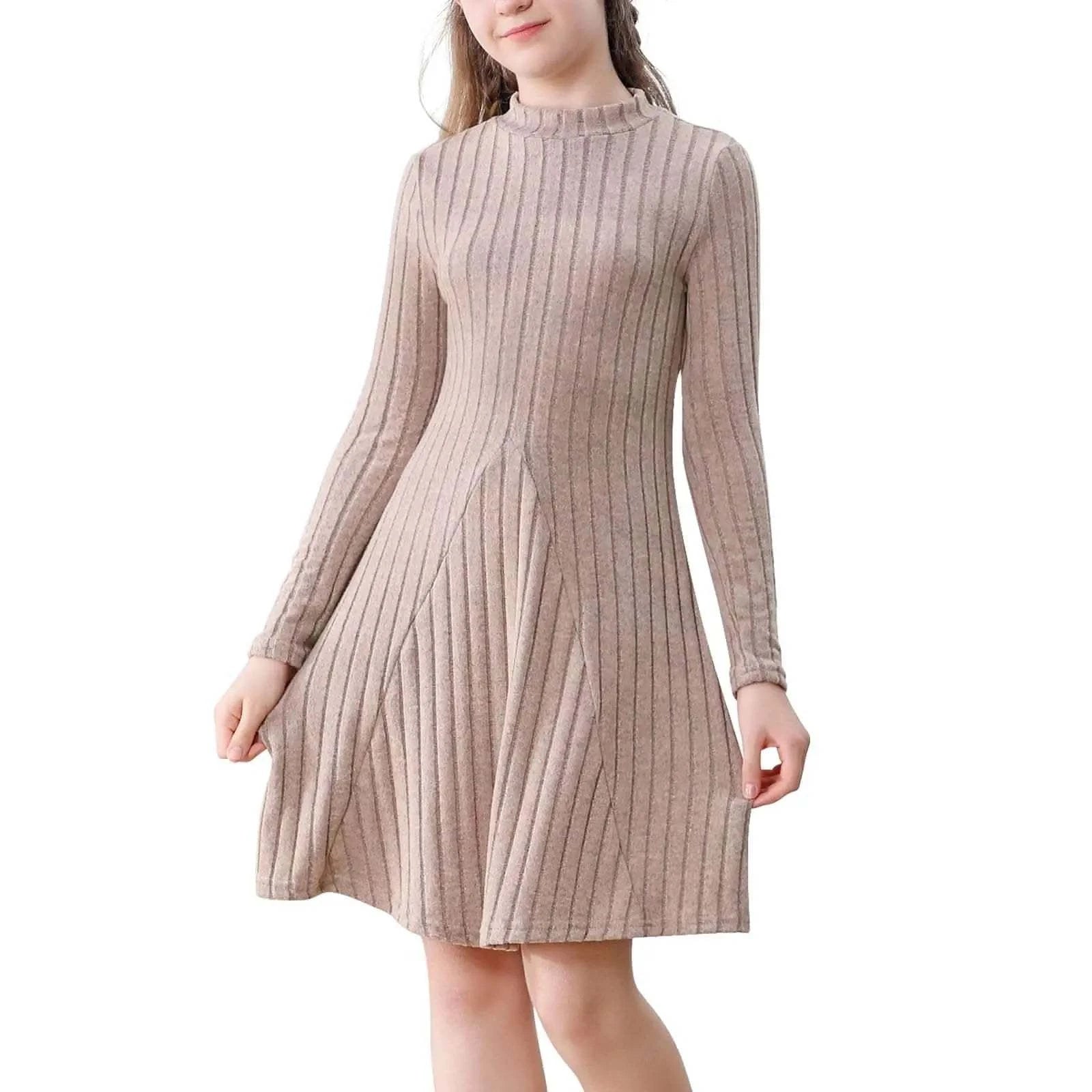 Woman wearing a cozy knit sweater dress styled with boots and leggings