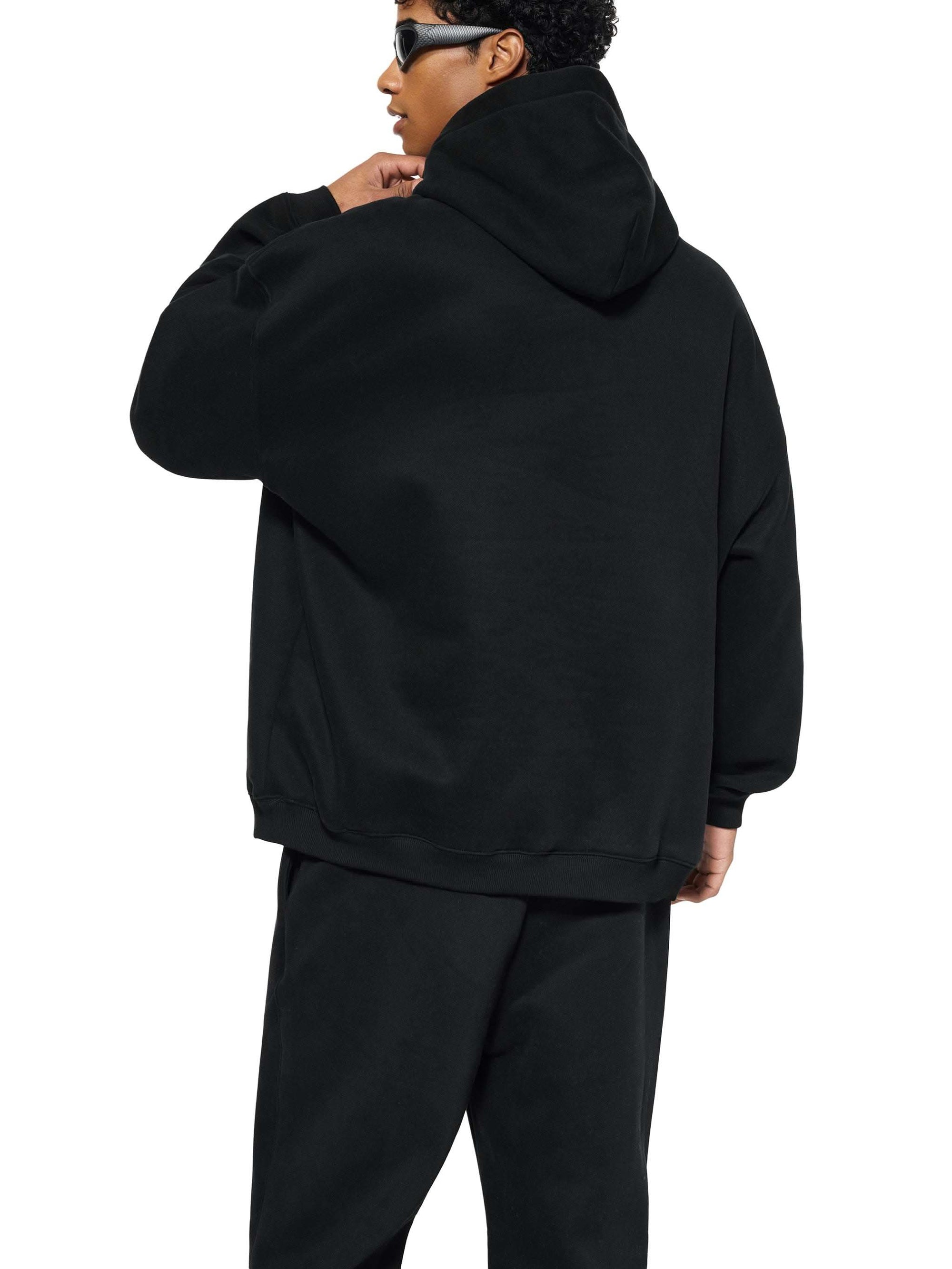 Oversize fleeced hoodie in heavyweight cotton blend with drop shoulders and adjustable hood for unisex streetwear style