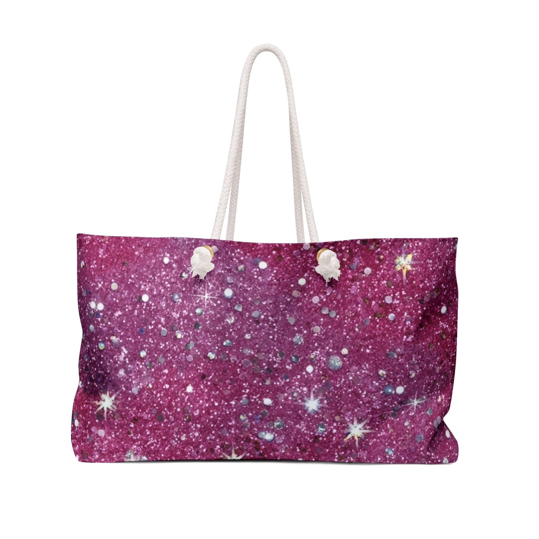 Glittery pink weekender bag with sparkle design, rope handles, and spacious interior for travel.