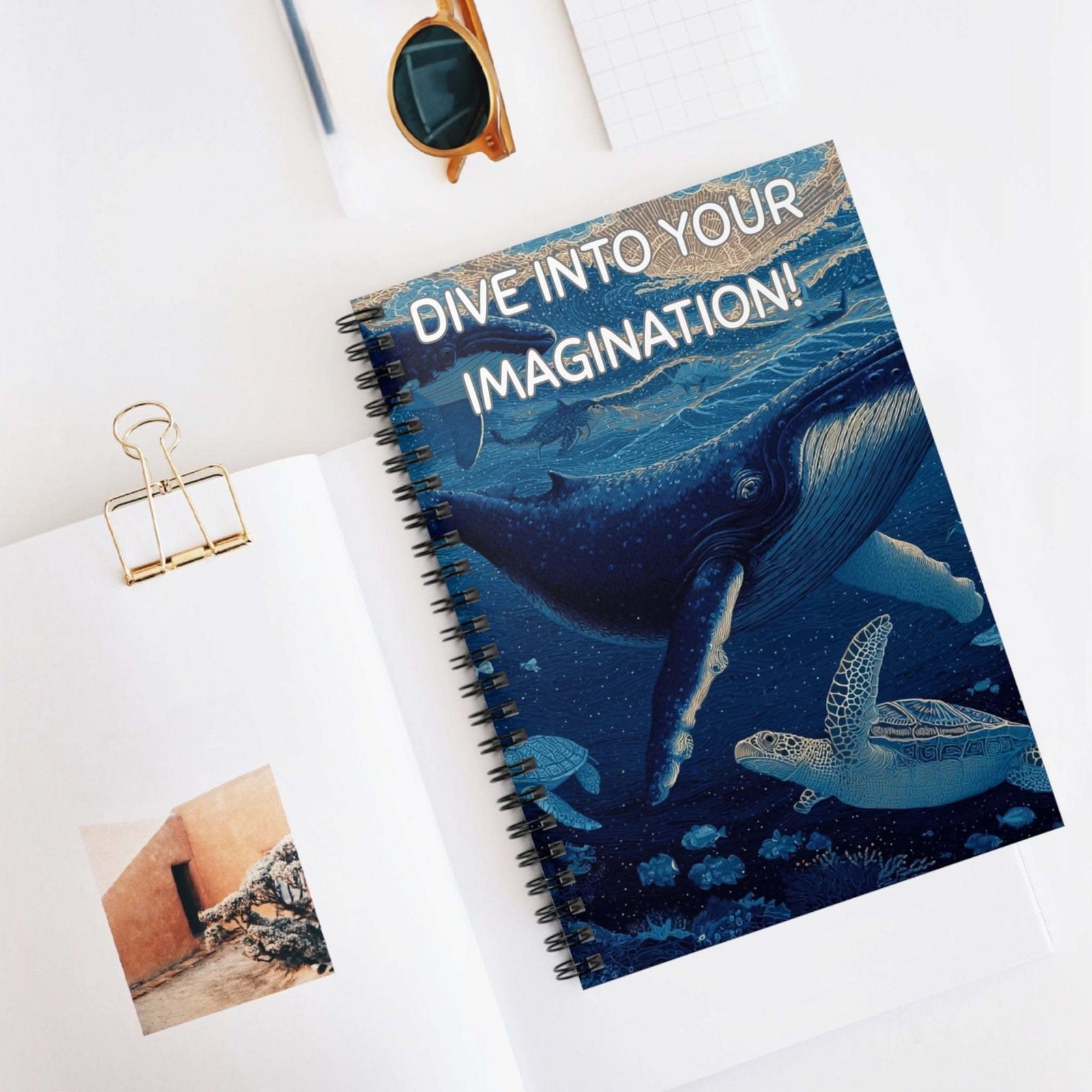 Undersea Spiral Notebook with whale and turtle illustration and "Dive into your imagination" text on cover