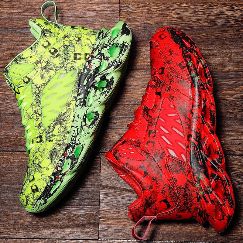 Pair of trendy camouflage sports shoes in neon green and red with black marbled pattern, low flat heel and rubber sole for men.
