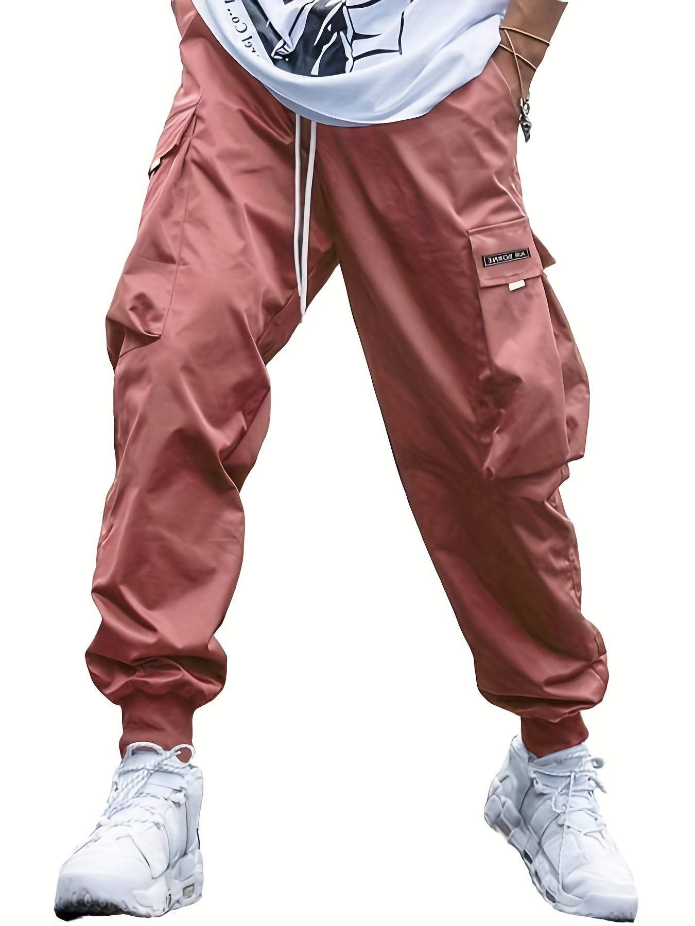 Men's multi-pocket cargo pants in brown with drawstring waist and elastic cuffs, casual hip-hop style outdoor streetwear trousers.