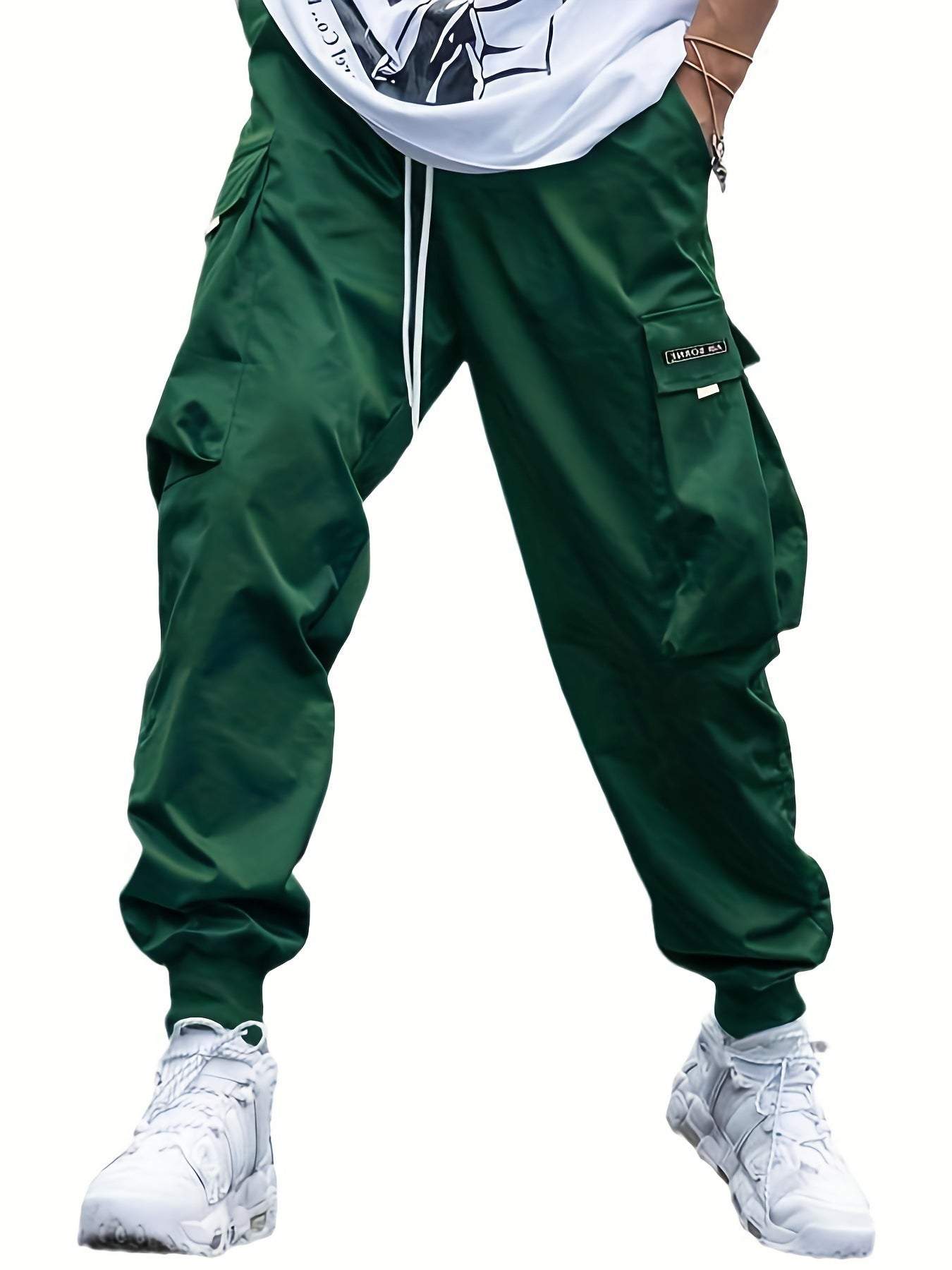 Men's green multi-pocket cargo pants with drawstring waist and loose fit for casual and outdoor wear