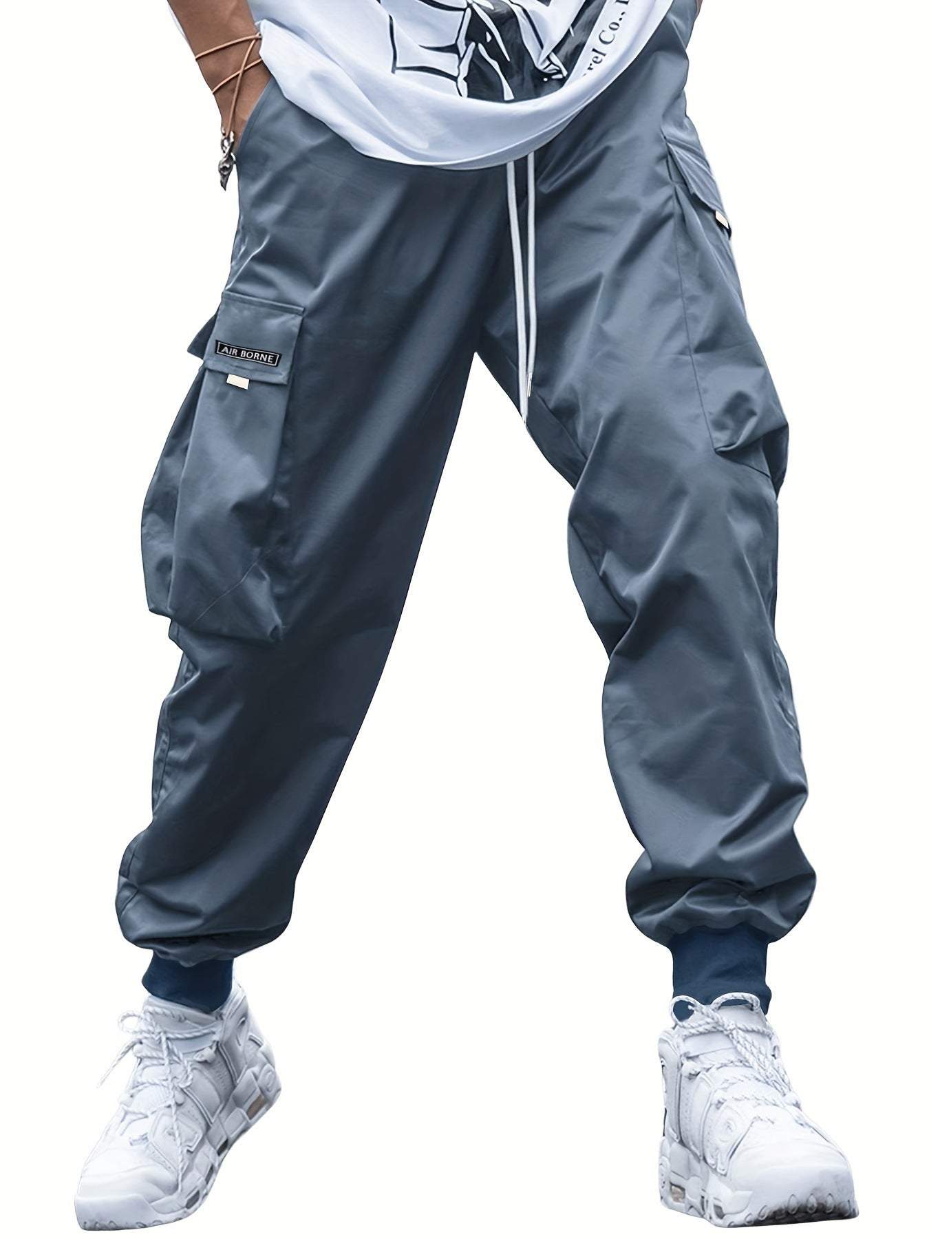 Men's gray multi-pocket cargo pants with drawstring waist and elastic cuffs, casual hip-hop style outdoor streetwear sports trousers