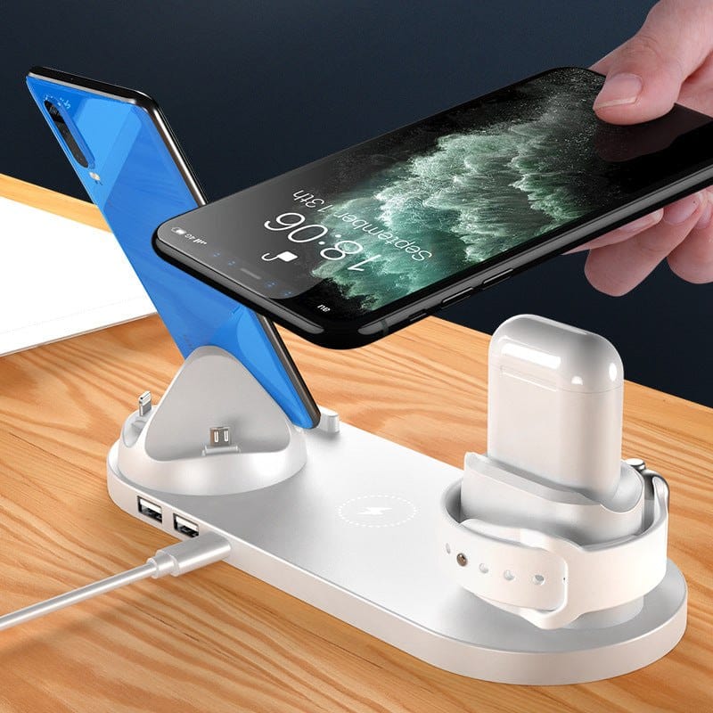 6 in 1 wireless charger station for phones, watches, and earbuds with fast charging capability and USB interface on wooden table