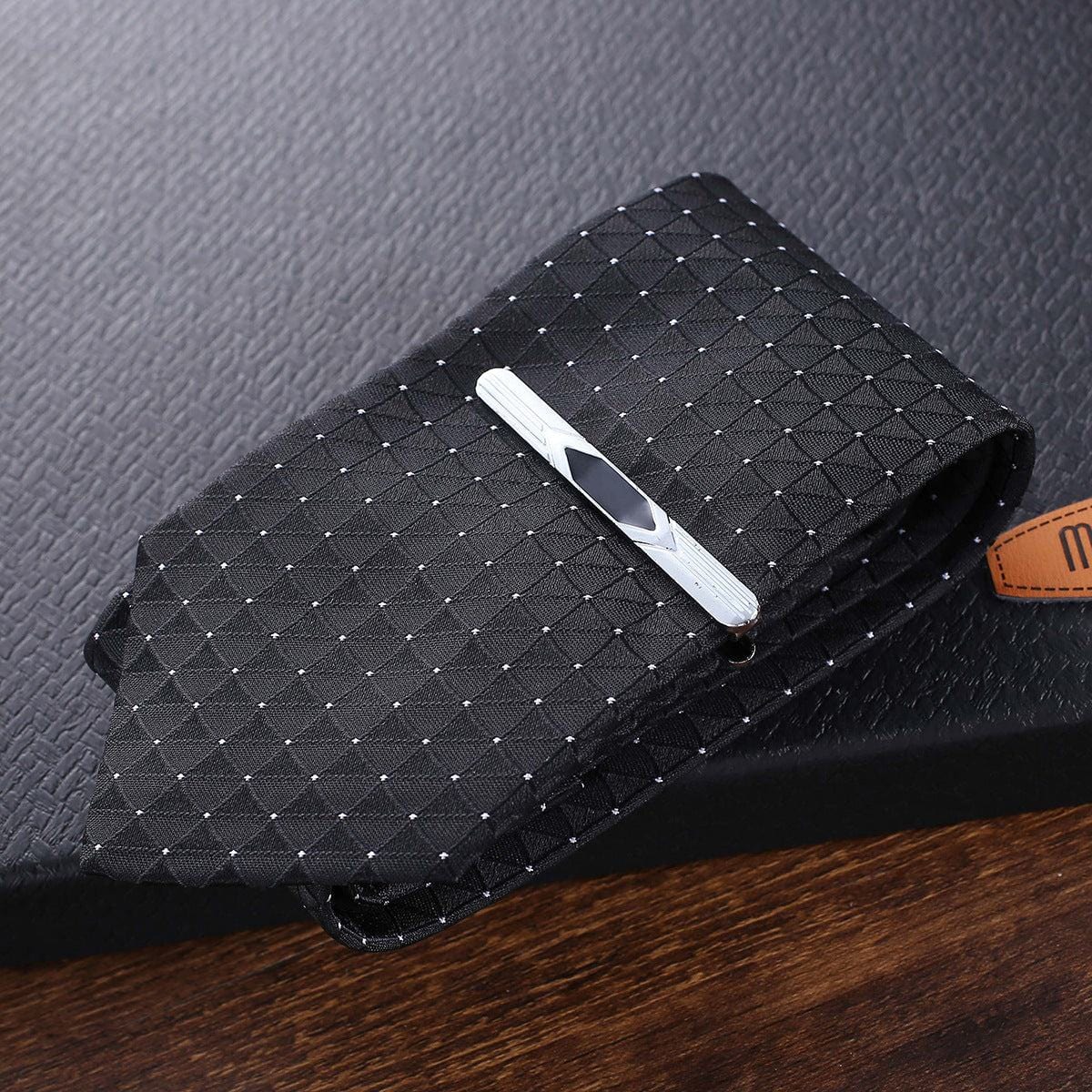 Black patterned men's tie with silver tie clip, fashion creative gift accessory.
