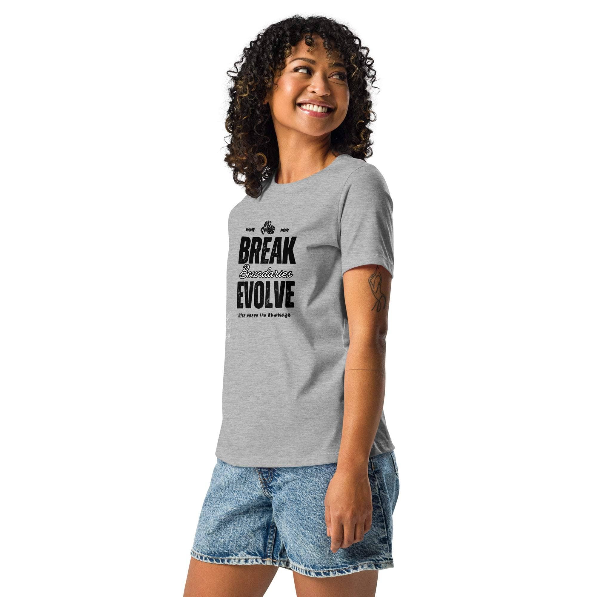 Woman wearing grey Break Boundaries Evolve T-Shirt with motivational quote and denim shorts