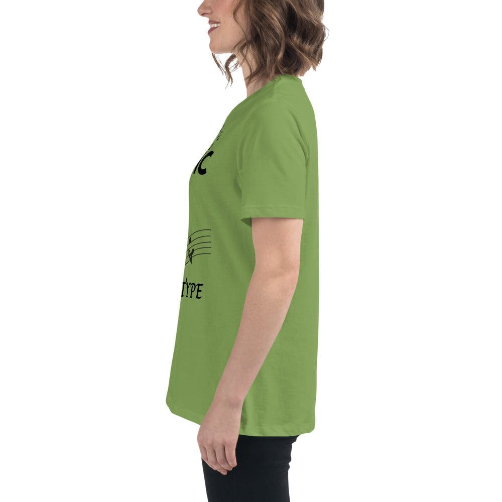 Side view of woman wearing green Music Girl T-Shirt with playful musical notes graphic and comfortable fit