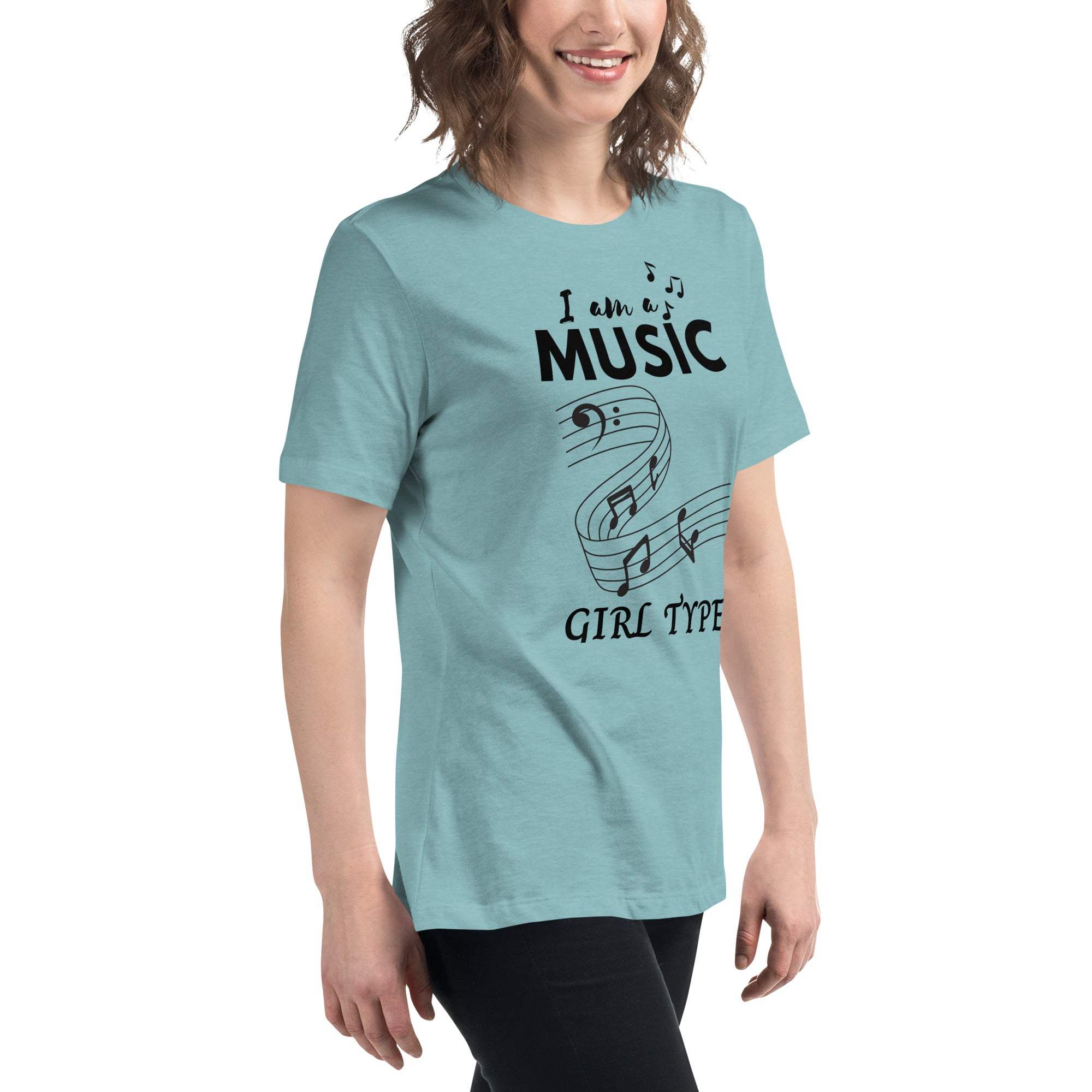 Woman wearing a light blue Music Girl T-Shirt with playful musical notes graphic and text design