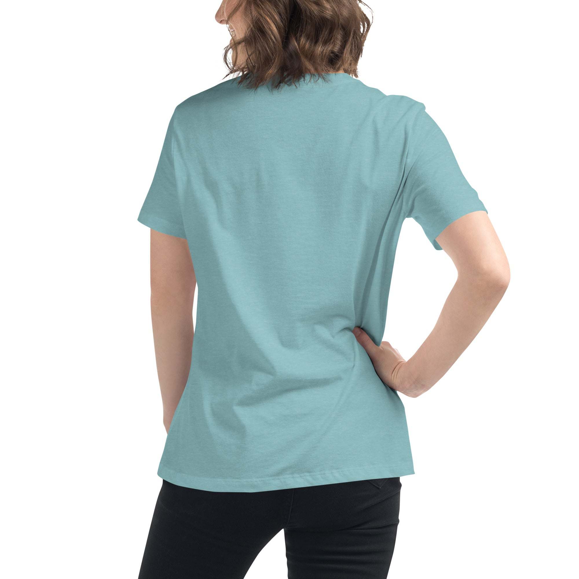 Woman wearing a light blue Music Girl T-Shirt with short sleeves and black pants, shown from the back.