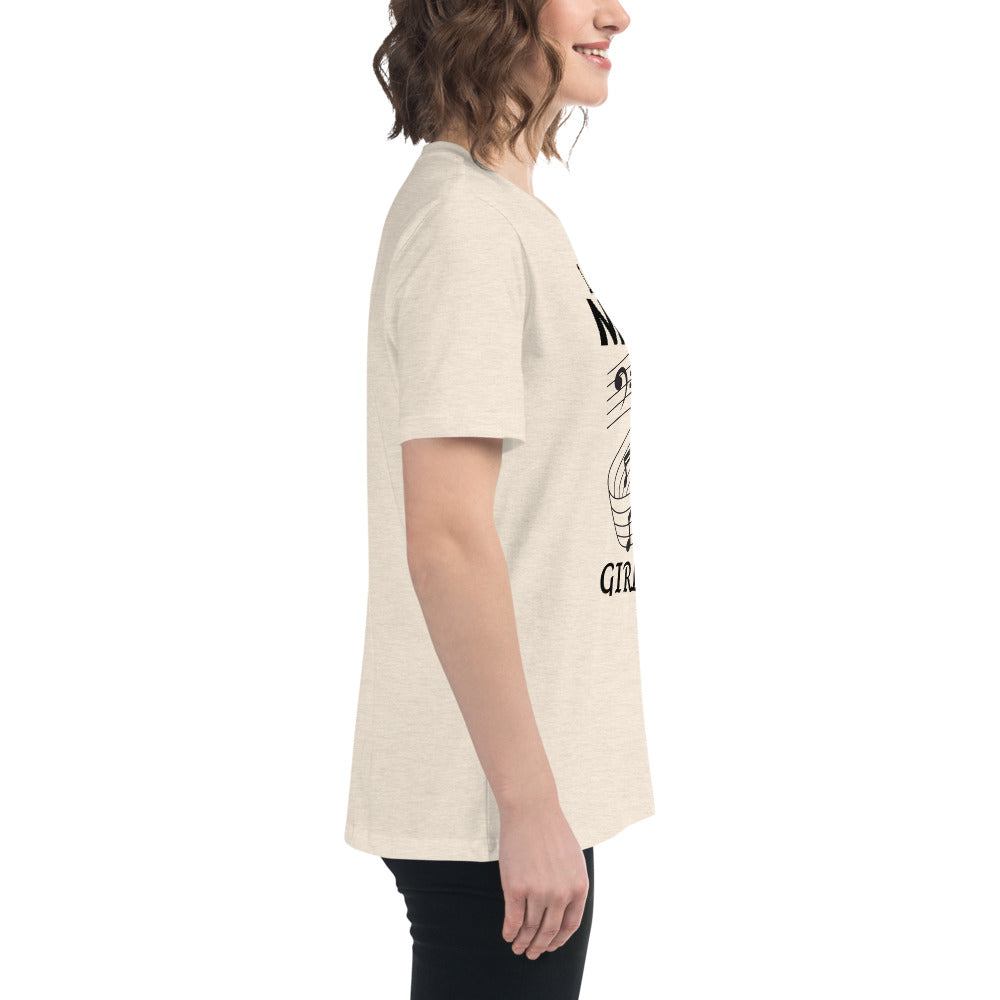 Side view of a woman wearing a beige Music Girl T-Shirt with a playful musical notes graphic, styled casually with black pants