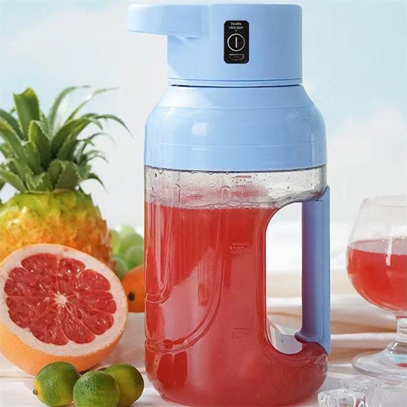Portable blue summer electric juicer with 1500ml capacity filled with red juice next to fresh fruits and a glass of juice