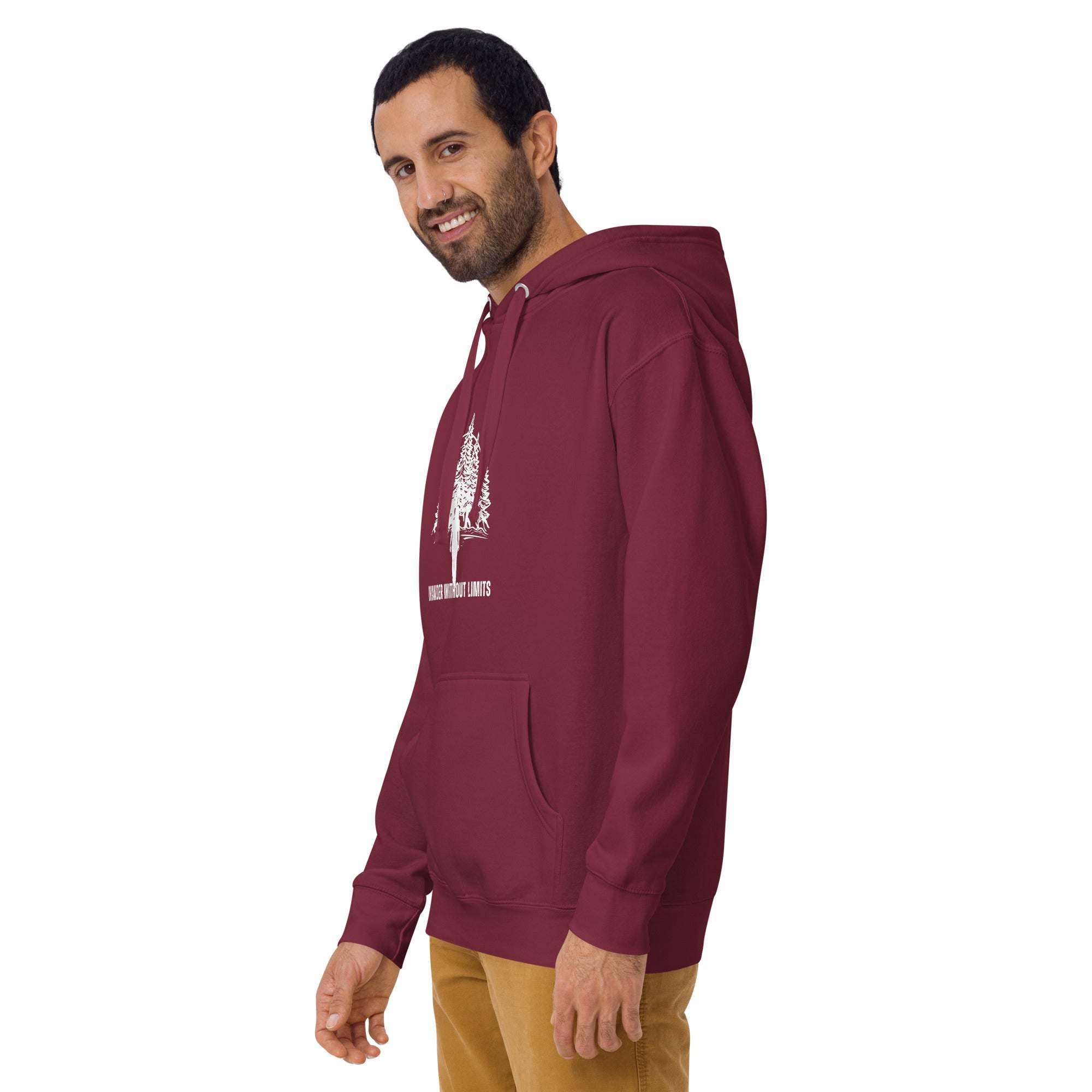 Man wearing maroon Wander Without Limits Hoodie with wilderness graphic and front pocket