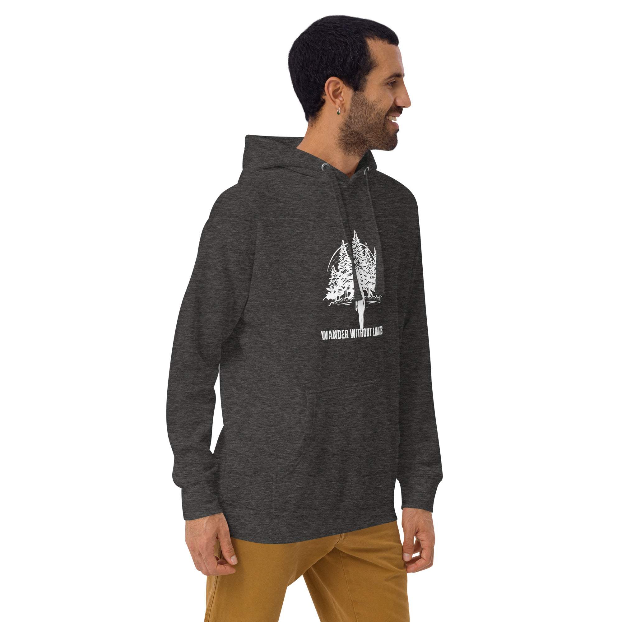 man wearing dark gray Wander Without Limits Hoodie with wilderness tree graphic and kangaroo pocket