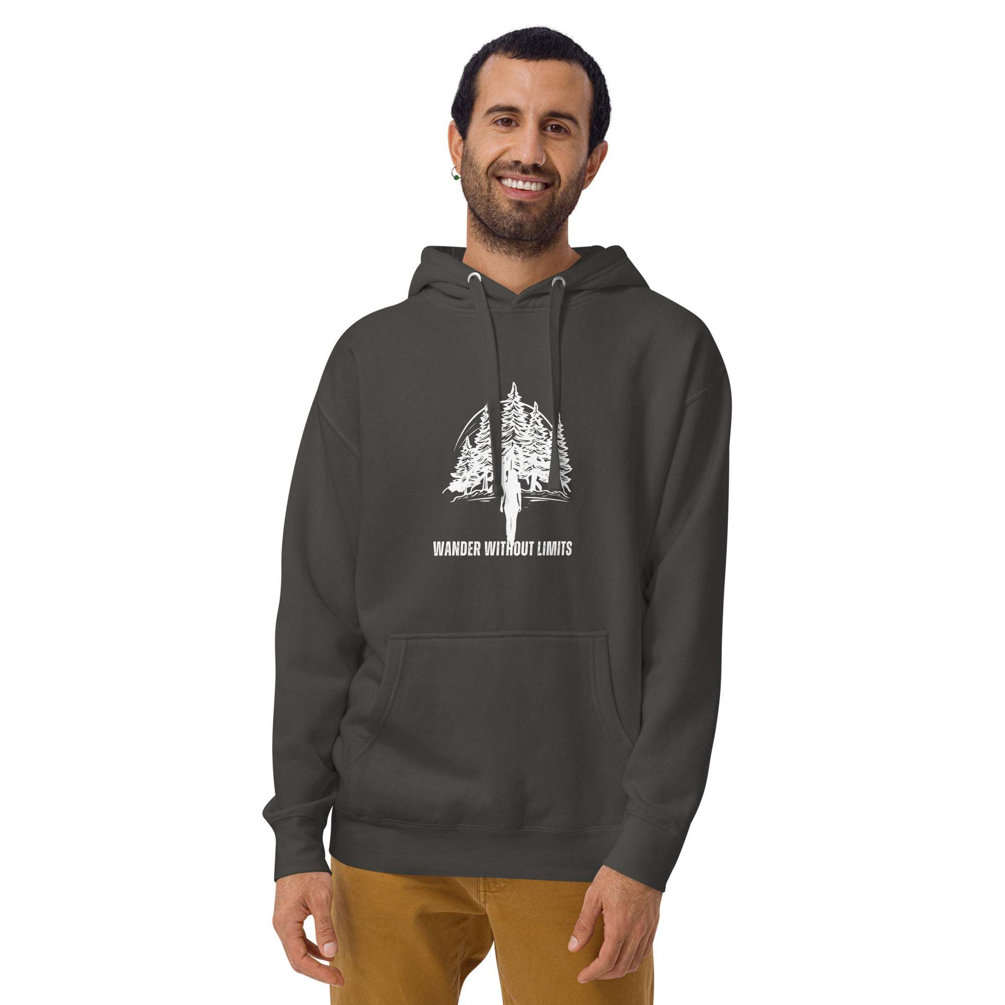 Man wearing a dark Wander Without Limits Hoodie with wilderness graphic and front pocket