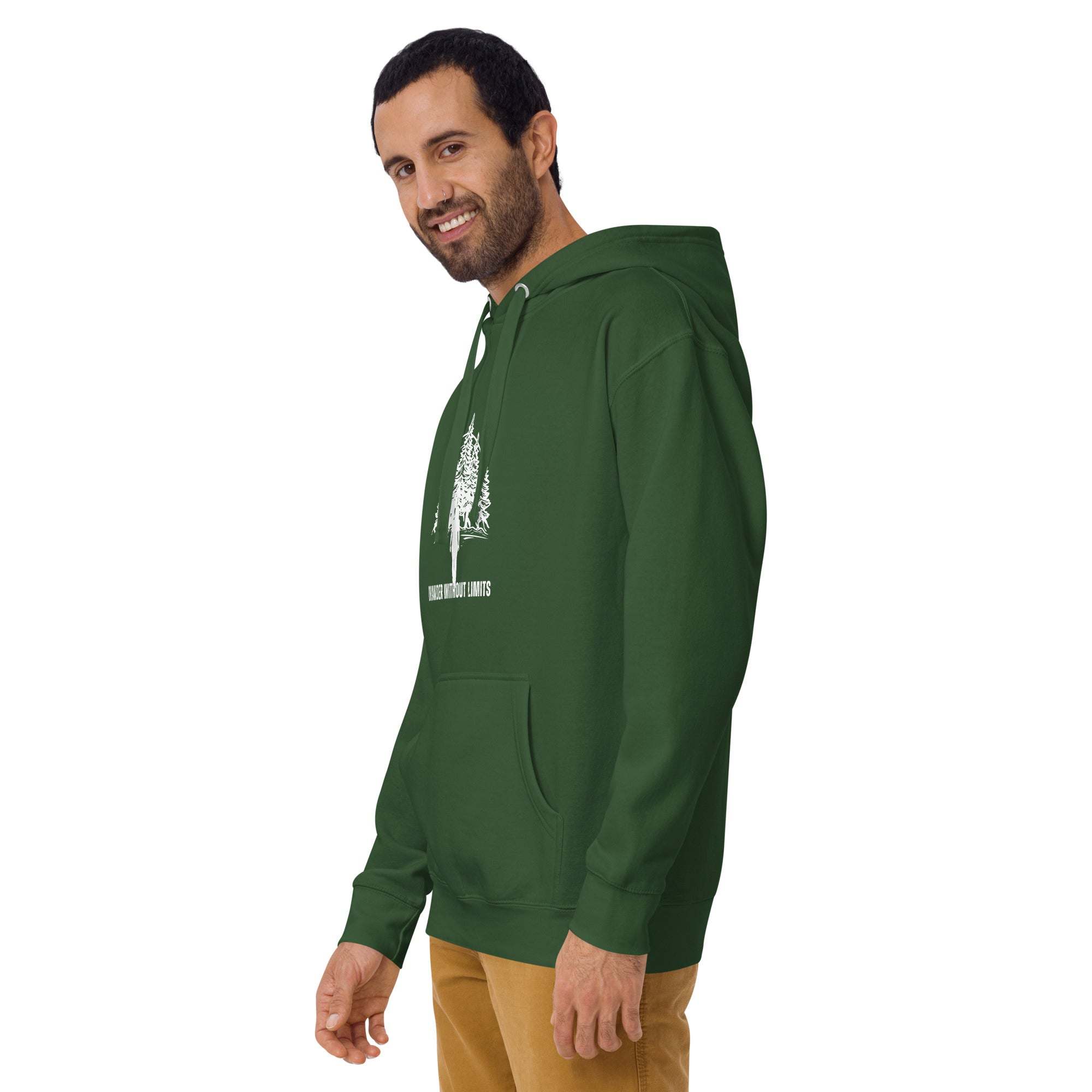Man wearing green Wander Without Limits Hoodie with wilderness graphic design