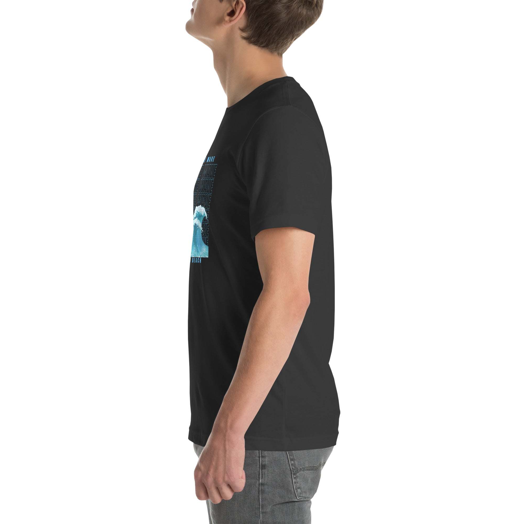 Side view of man wearing black Ride the Wave T-Shirt with wave design