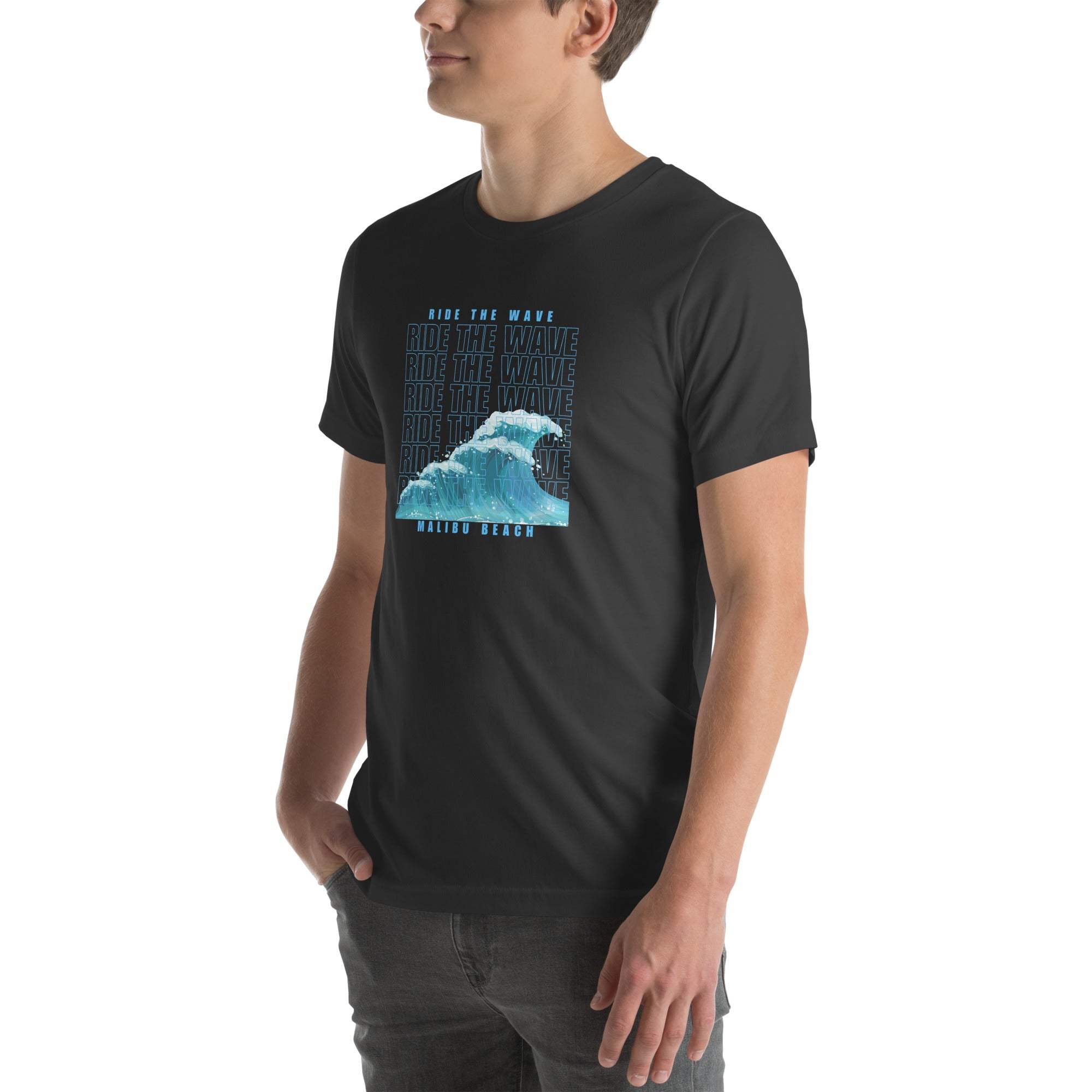 Black Ride the Wave T-Shirt with blue wave graphic and text, worn by male model, casual fit ocean-inspired tee