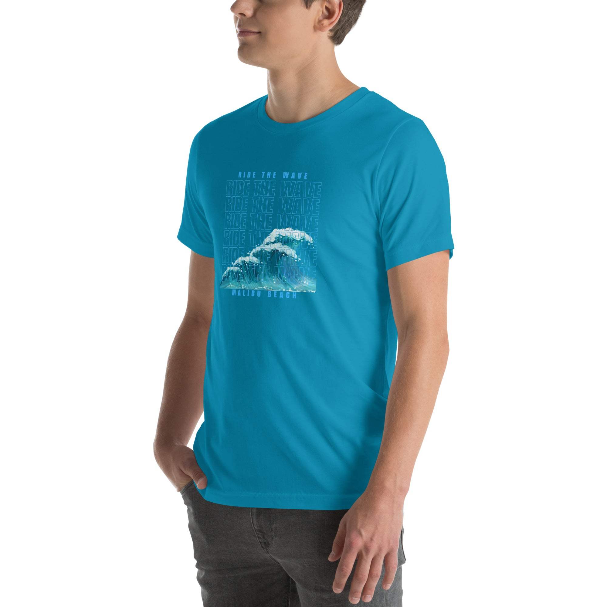 Man wearing blue Ride the Wave T-Shirt with wave graphic design on front