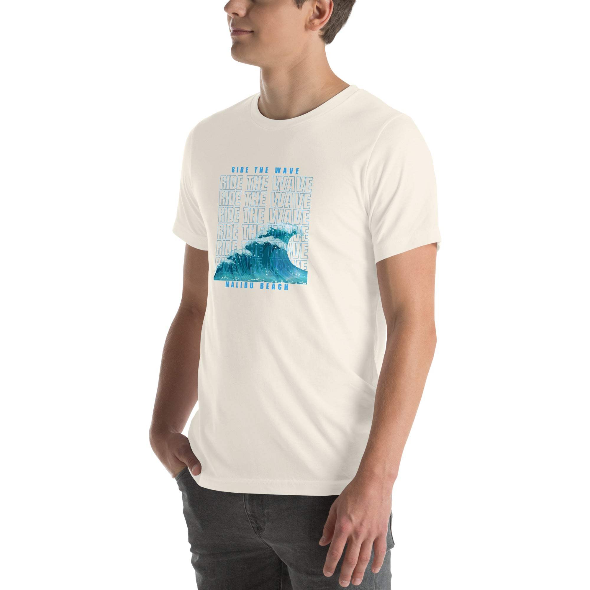 Man wearing white Ride the Wave T-Shirt with blue wave graphic and text design
