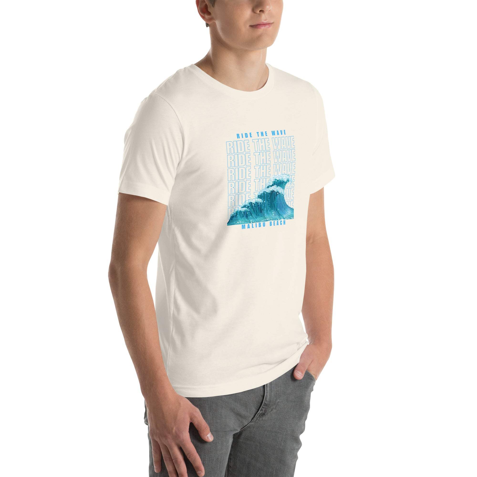 Man wearing white Ride the Wave T-Shirt with blue wave graphic and text design