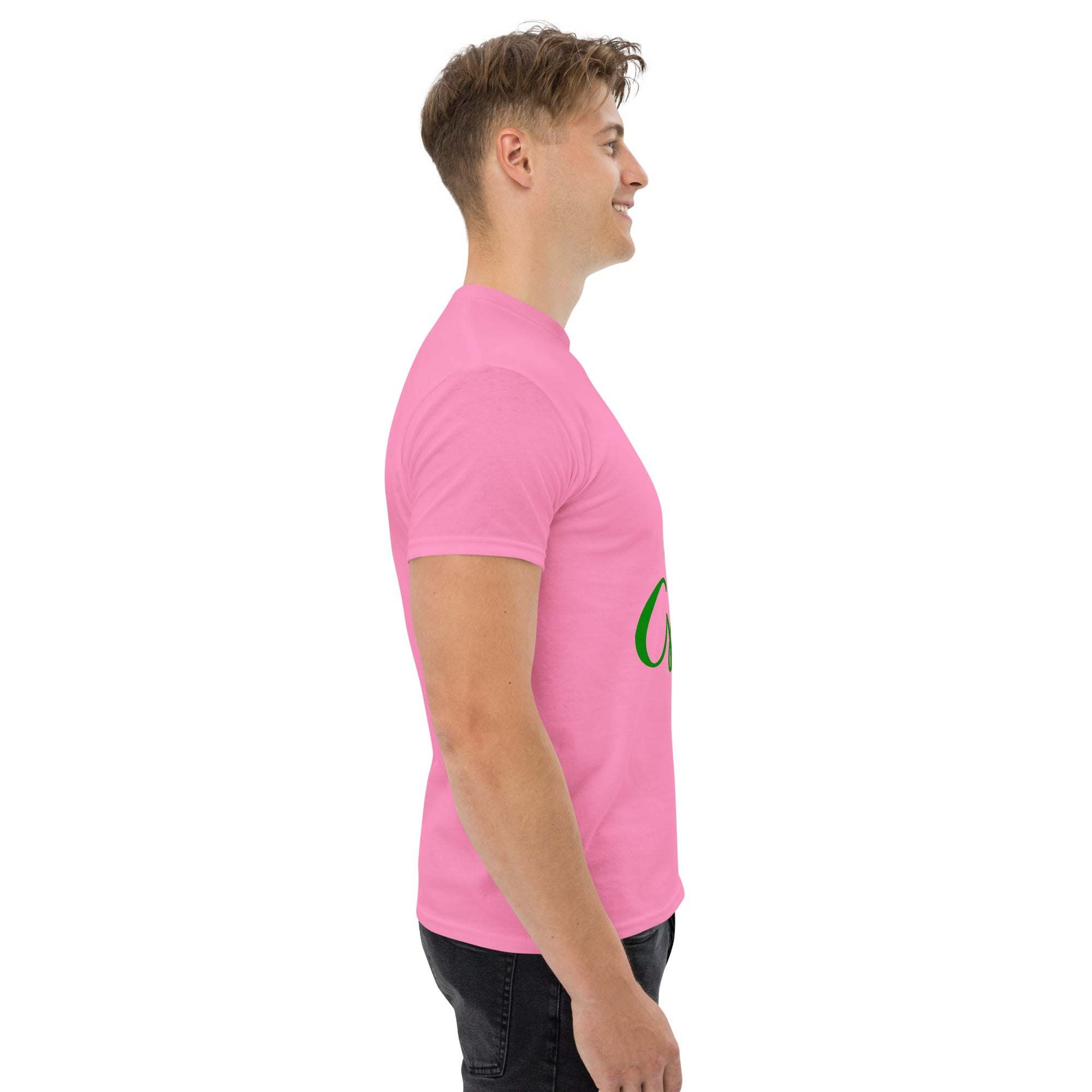 Side view of a man wearing a pink Go Green T-Shirt made from sustainable materials with an eco-friendly design