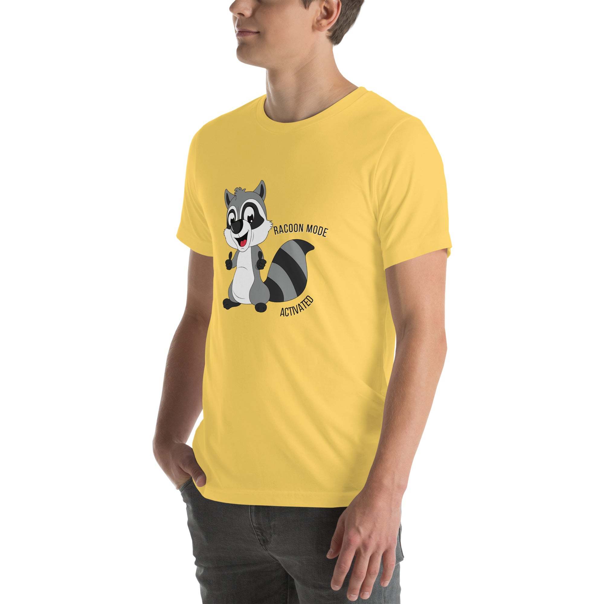 Man wearing yellow Raccoon Mode T-Shirt with cartoon raccoon and text "Raccoon Mode Activated"