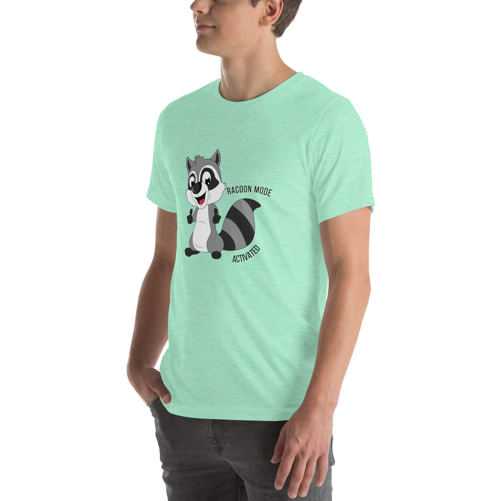 Man wearing mint green Raccoon Mode T-Shirt with cartoon raccoon and "RACCOON MODE ACTIVATED" text