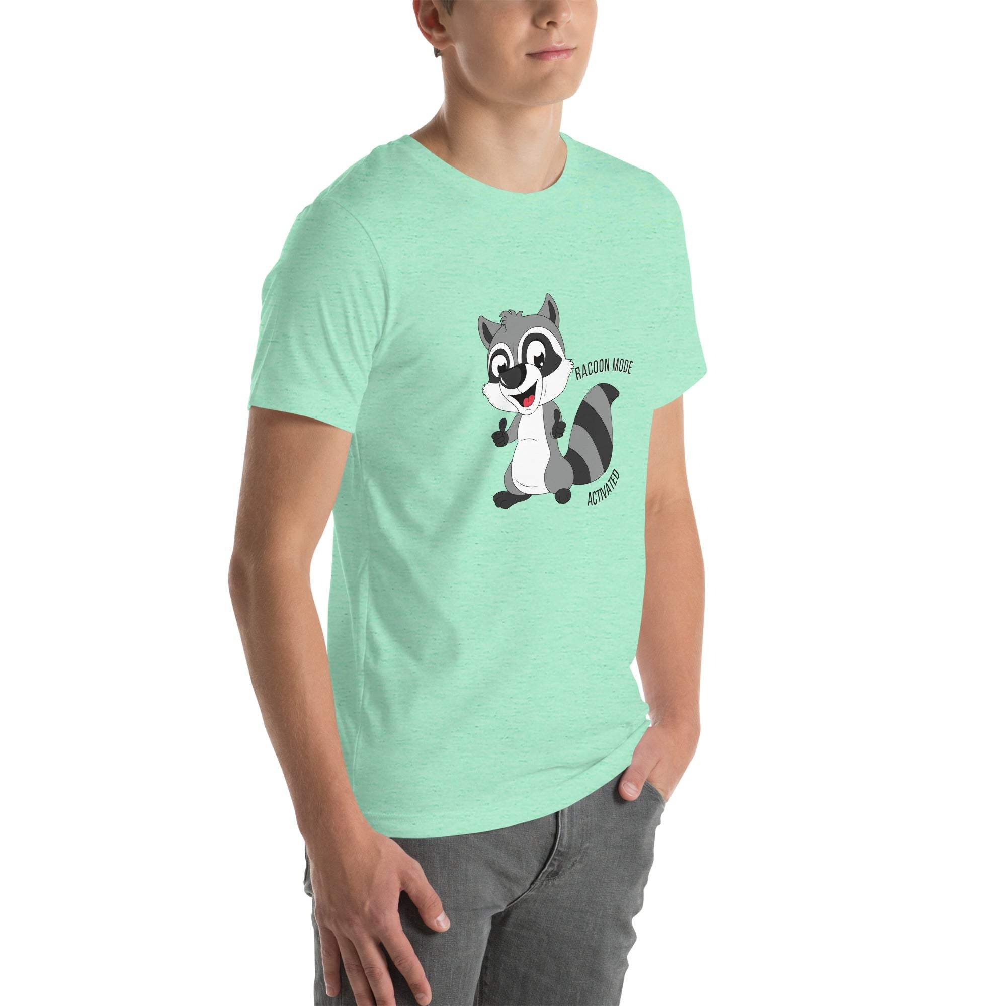 Man wearing light green Raccoon Mode T-Shirt with cartoon raccoon and "Raccoon Mode Activated" text on front