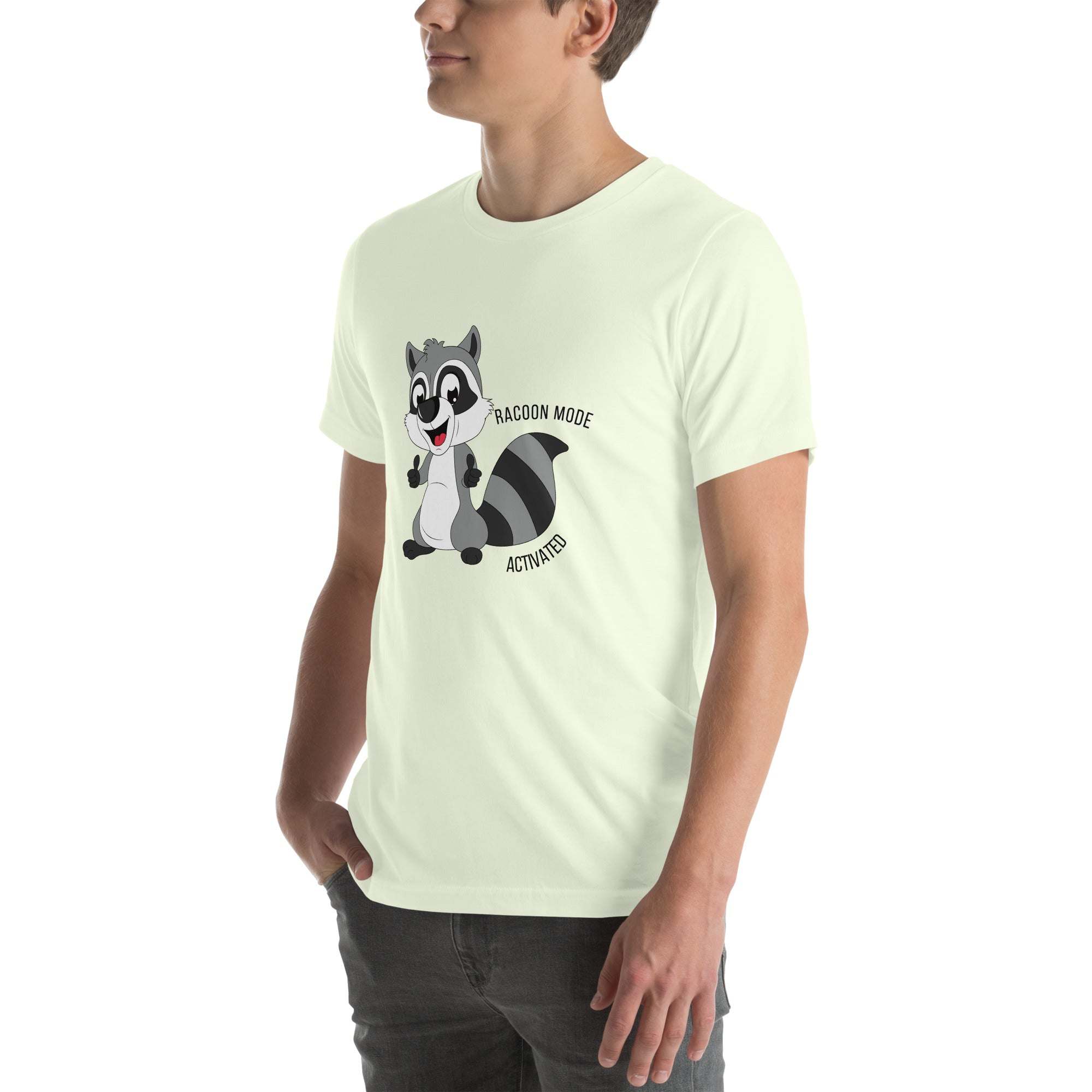 Man wearing white Raccoon Mode T-Shirt with cartoon raccoon and text "Raccoon Mode Activated" in casual pose